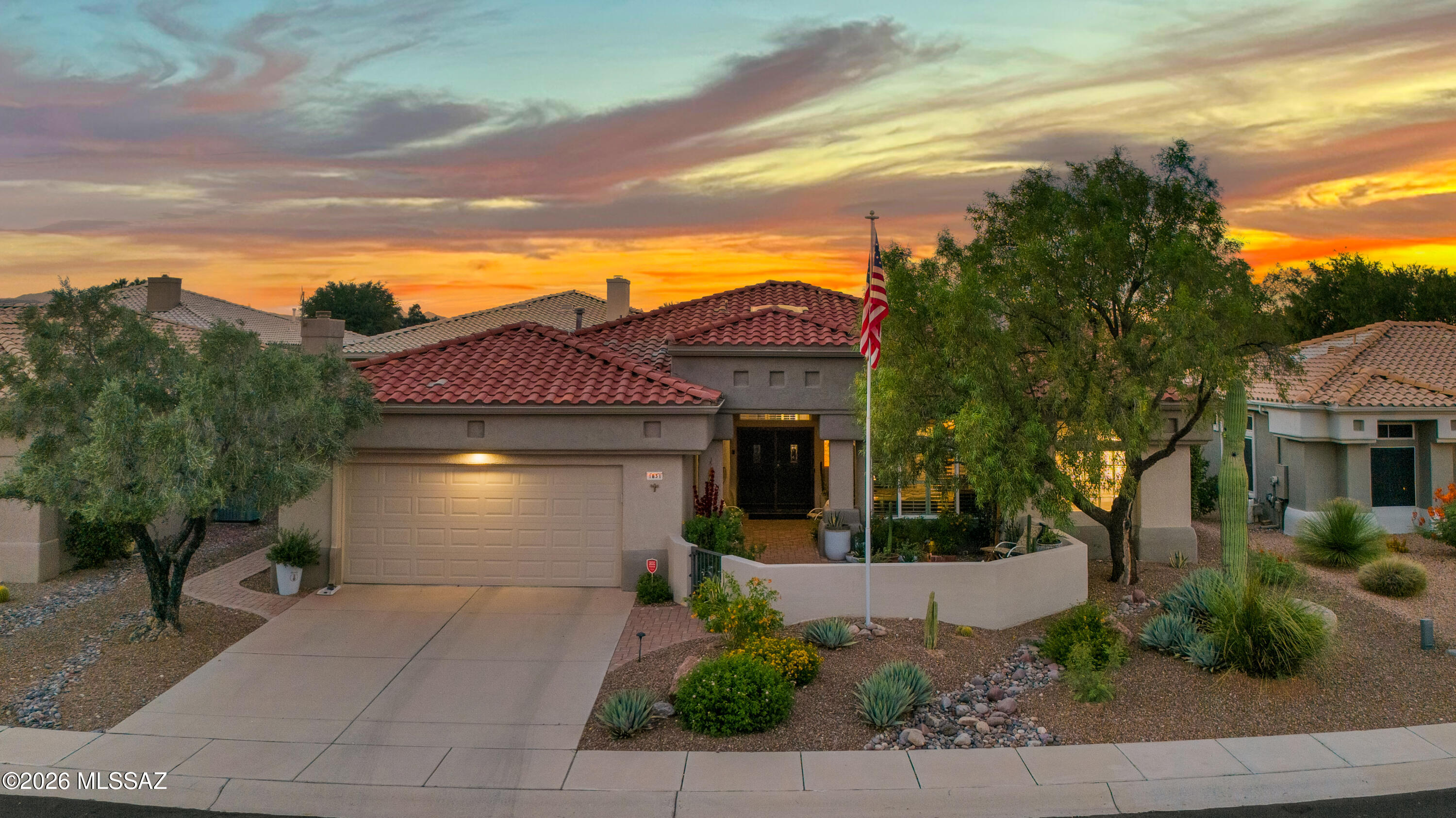 Welcome to this beautifully designed Mountain View model in the sought-after active 55+ community of Sun City Oro Valley. This spacious 2-bedroom, 2.5-bath home features a desirable split floor plan designed for comfort, privacy, and easy living. The private Primary Suite offers a generous walk-in closet with built-in storage, while the elegant Primary Bath features a walk-in shower, relaxing soaking tub, and dual-sink vanity. Throughout the home, tile and laminate flooring provide a clean, low-maintenance lifestyle with no carpet. Plantation shutters add timeless style while offering privacy and control of natural light. The well-designed kitchen is perfect for entertaining, featuring a center island, gas cooktop, built-in oven and microwave, along with abundant cabinetry & counter space. The adjacent living areas flow seamlessly to the beautifully landscaped backyard, where an extended covered patio creates the perfect space for outdoor relaxation and enjoying Arizona's beautiful weather. 

A welcoming walled courtyard showcases spectacular Catalina Mountain views, creating a peaceful setting to unwind. The dedicated office includes a built-in desk and storage, providing a comfortable space for work, hobbies, or creative pursuits.

Sun City Oro Valley offers endless opportunities to stay active and engaged, with a vibrant clubhouse, golf course, fitness center, pool, and a wide variety of clubs, activities, and amenities designed for an exceptional active adult lifestyle.