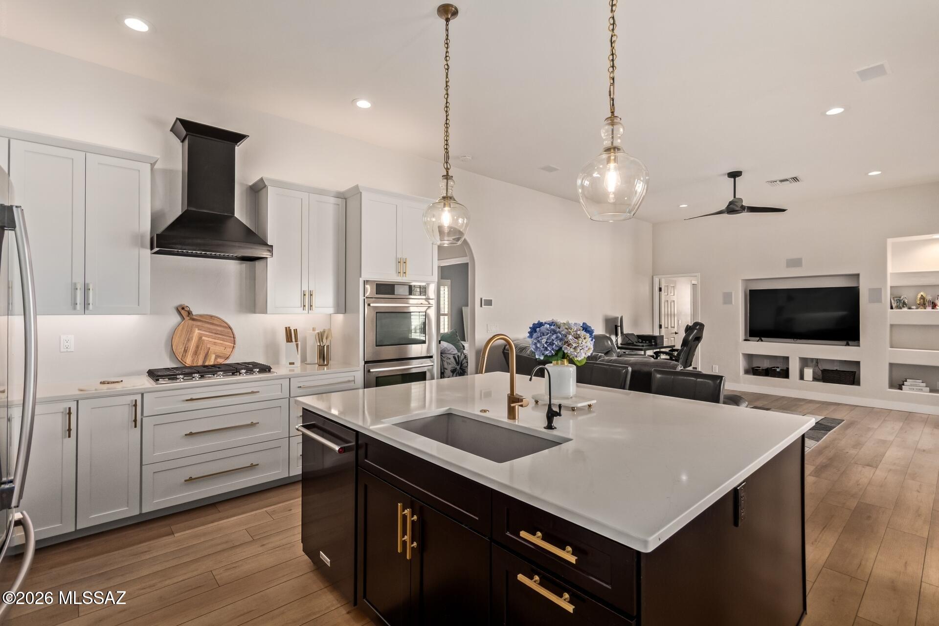 Situated on a quiet cul-de-sac in Oro Valley, this exceptional home blends comfort and ellegance into one unforgettable experience.
At the heart of the home is a beautifully remodeled kitchen, designed to impress with modern finishes and a seamless flow into the living spaces, perfect for entertaining or simply enjoying everyday moments in style.
Step outside and discover what truly sets this home apart: a resort-style backyard designed for year-round living. Your heated pool invites you in any season, while the outdoor kitchen creates the perfect setting for unforgettable gatherings under the beautiful Arizona sky.
Adding a highly functional touch, a Jack-and-Jill bathroom with direct access to the backyard offers effortless convenience for poolside living--keeping the indoors pristine Whether you're enjoying a quiet morning swim, hosting friends at sunset, or relaxing in your own private oasis, this home delivers the lifestyle you've been looking for.
Located in one of Oro Valley's most desirable areas, and with one of the biggest lots in the community, you'll enjoy the perfect balance of privacy, beauty, and convenience just minutes from everything you need.