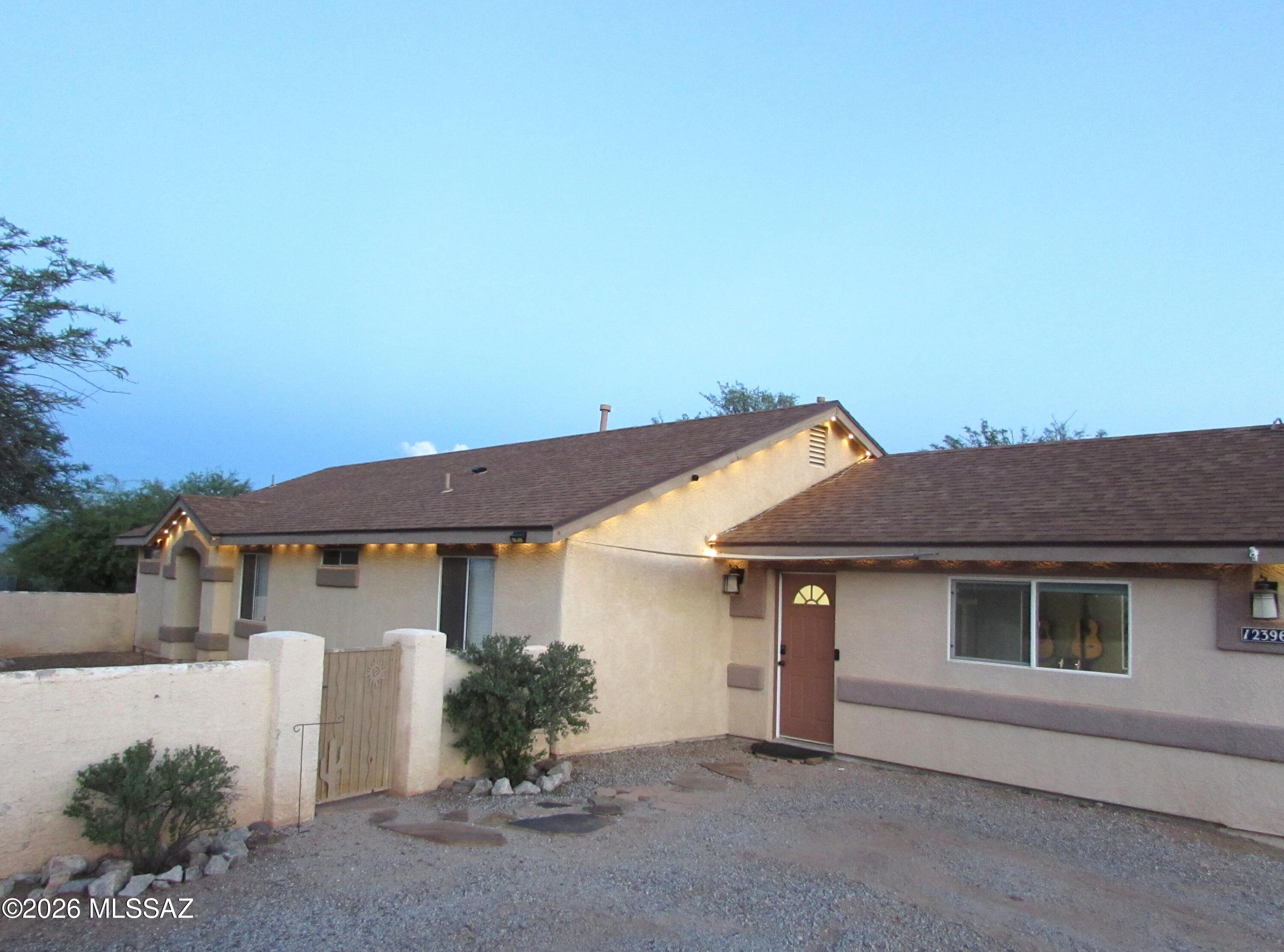 Beautiful Move-in ready 3brdm/2bthrm on almost a full acre of land. Surrounded by mountains and sunsets! Country living, but close to shopping, restaurants and entertainment. The solar will be paid at close of escrow. Remodeled interior to open kitchen to a great room concept. Large bonus rooms. New 50-gallon hot water heater. Huge, detached 4 car garage/workshop.  Recently remodeled back yard with added artificial turf, covered patio and a dog run that leads into a dog area inside the home. Large utility garden shed. Sentricon termite system is good till 08/08/2027.Seller open to negotiations of loan interest rate Buydown - contingent to offer negotiations.
