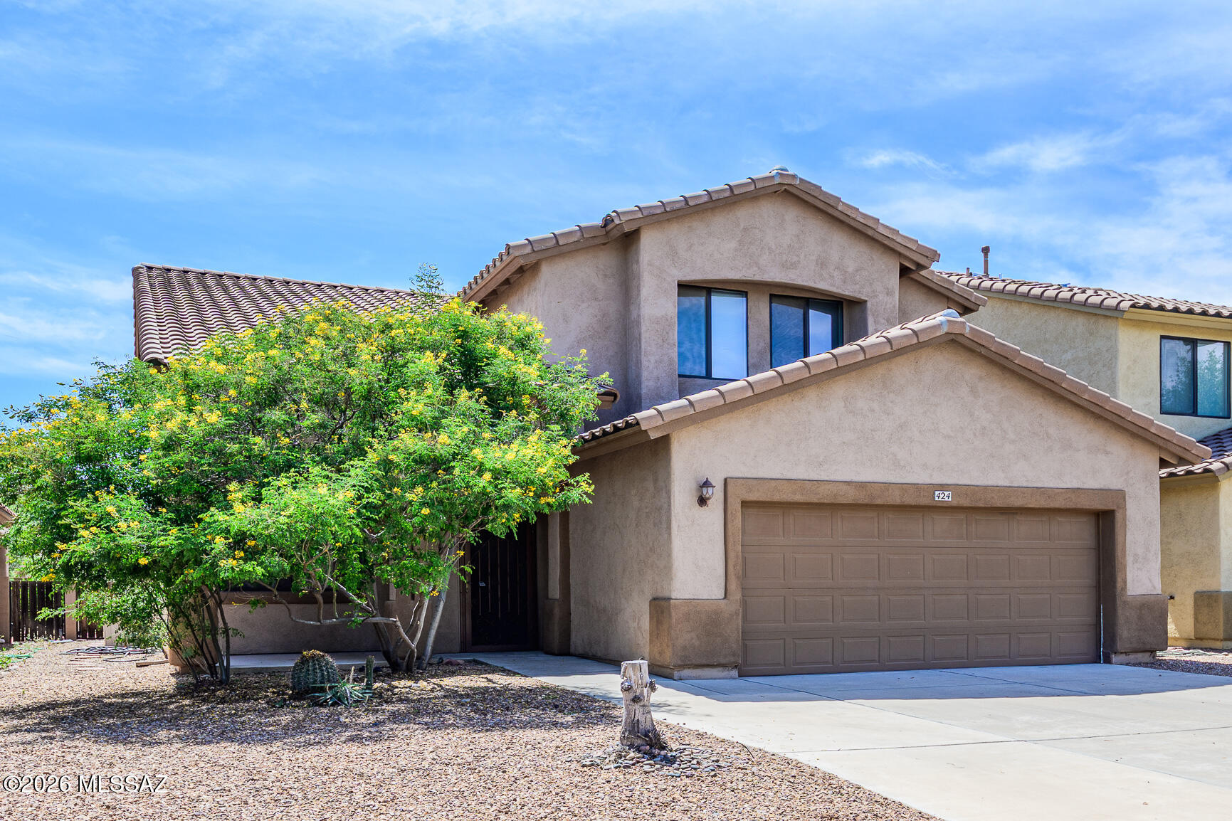 Welcome to this tastefully appointed Insight built home offering 4 bd/3 full baths and 2,300 square feet of thoughtfully designed living space in the sought after Rancho Sahuarita community.
This functional floor plan features a guest bedroom and full bath on the main level, ideal for visitors, multi-generational living, or  private home office. Inside, you'll find a bright and open layout filled with natural light. The spacious living area flows seamlessly into the kitchen and dining spaces, creating the perfect environment for everyday living and entertaining.
The kitchen features stainless steel appliances, sleek quartz countertops, and  spacious pantry, offering style and convenience for any home chef.
Upstairs, a versatile loft provides additional living space perfect for a media room, play area, or workspace. The primary suite offers a spa-like retreat, while two additional bedrooms provide comfort and flexibility.
Step outside to your private backyard oasis, complete with a sparkling pool, artificial turf, mature trees, decorative gravel, and an extended covered patio--perfect for relaxing or entertaining year-round.
Residents of Rancho Sahuarita enjoy exceptional amenities, including parks, a clubhouse, fitness center, playgrounds, dog parks, skate park, and a scenic 11-acre lake. Conveniently located just minutes from dining, shopping, a nearby casino, and easy access to the I-19 corridor.
