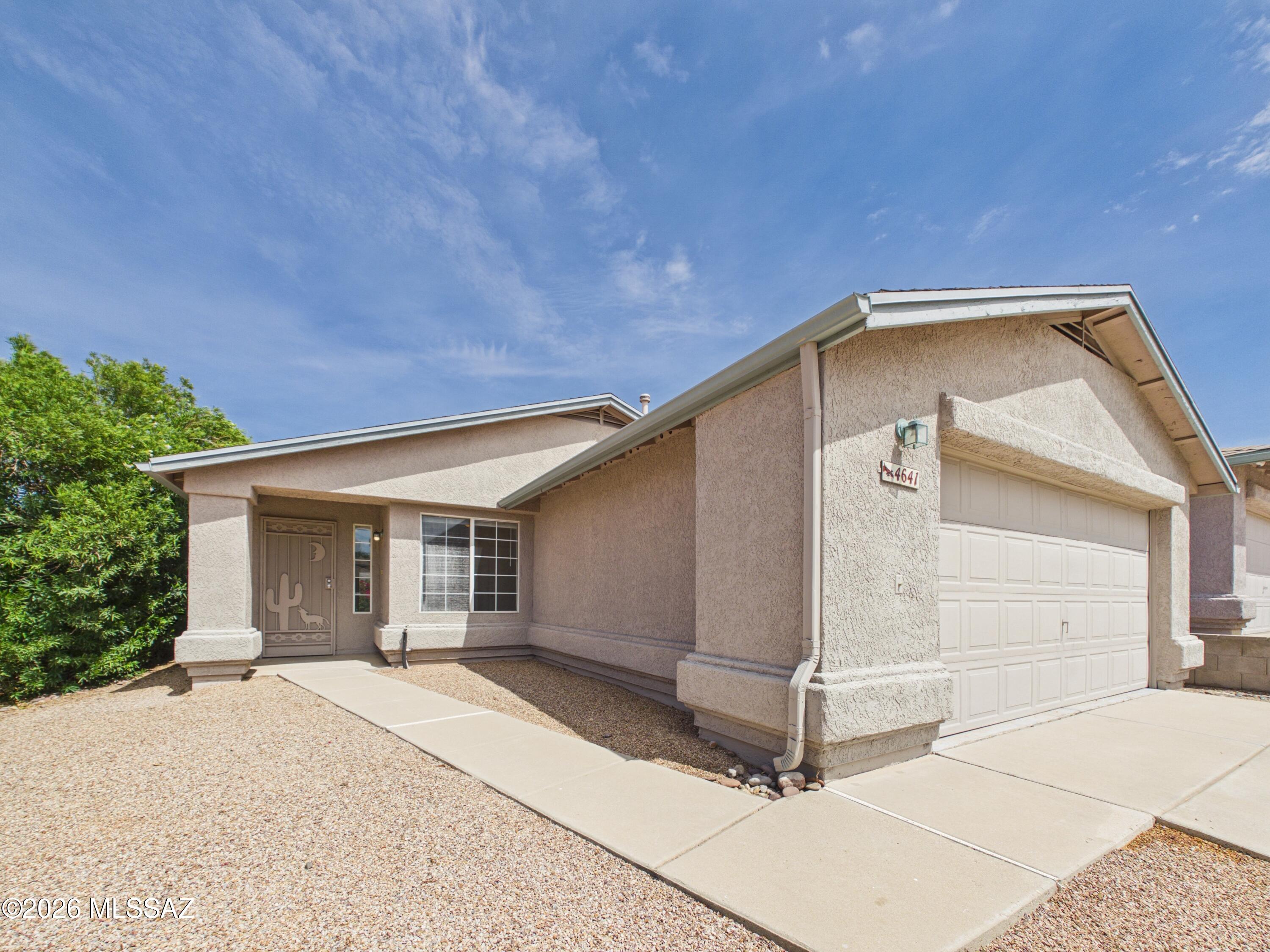Welcome to this charming 3-bedroom, 2-bath home in Tucson's desirable southeast area. This well-maintained residence offers a functional floor plan with comfortable living spaces, abundant natural light, and a kitchen featuring ample cabinetry and included appliances. The primary suite provides a private retreat, while the spacious backyard with covered patio creates the perfect setting for outdoor relaxation and entertaining. Additional highlights include a 2-car garage, laundry area, and a convenient location near shopping, dining, parks, Davis-Monthan Air Force Base, and major roadways. Move-in ready and waiting for its next owner!