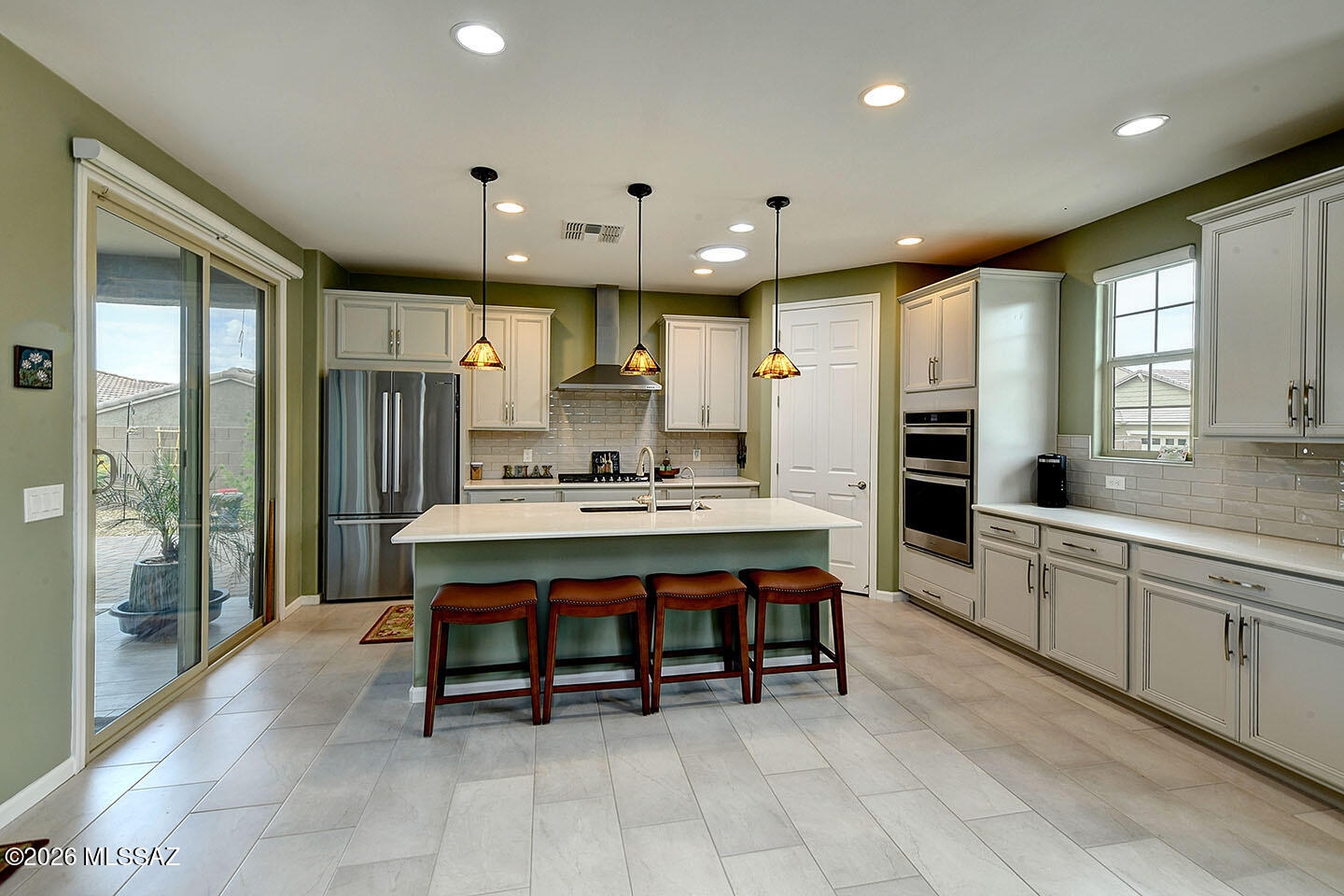 Welcome to this exceptional home nest nestled on a premium corner lot in the sought-after Saguaro Trails community. Built in 2020, this stunning 3BD/2.5BA residence, with a flexible office or optional 4th bedroom, features professional landscaping, an extended paver patio with built-in BBQ, fire pit, and luxurious Jacuzzi hot tub. Inside, enjoy an open great room design with 9' ceilings, designer finishes, upgraded chef's kitchen, quartz counters & custom California closets. Additional Upgrades include electric blinds, solar tubes, surround sound, water softener and 2-car garage with epoxy flooring. With top-rated Vail schools and numerous community amenities, including playgrounds, dog park, pool & splash pad, this home offers comfort, style, and convenience in one perfect package.