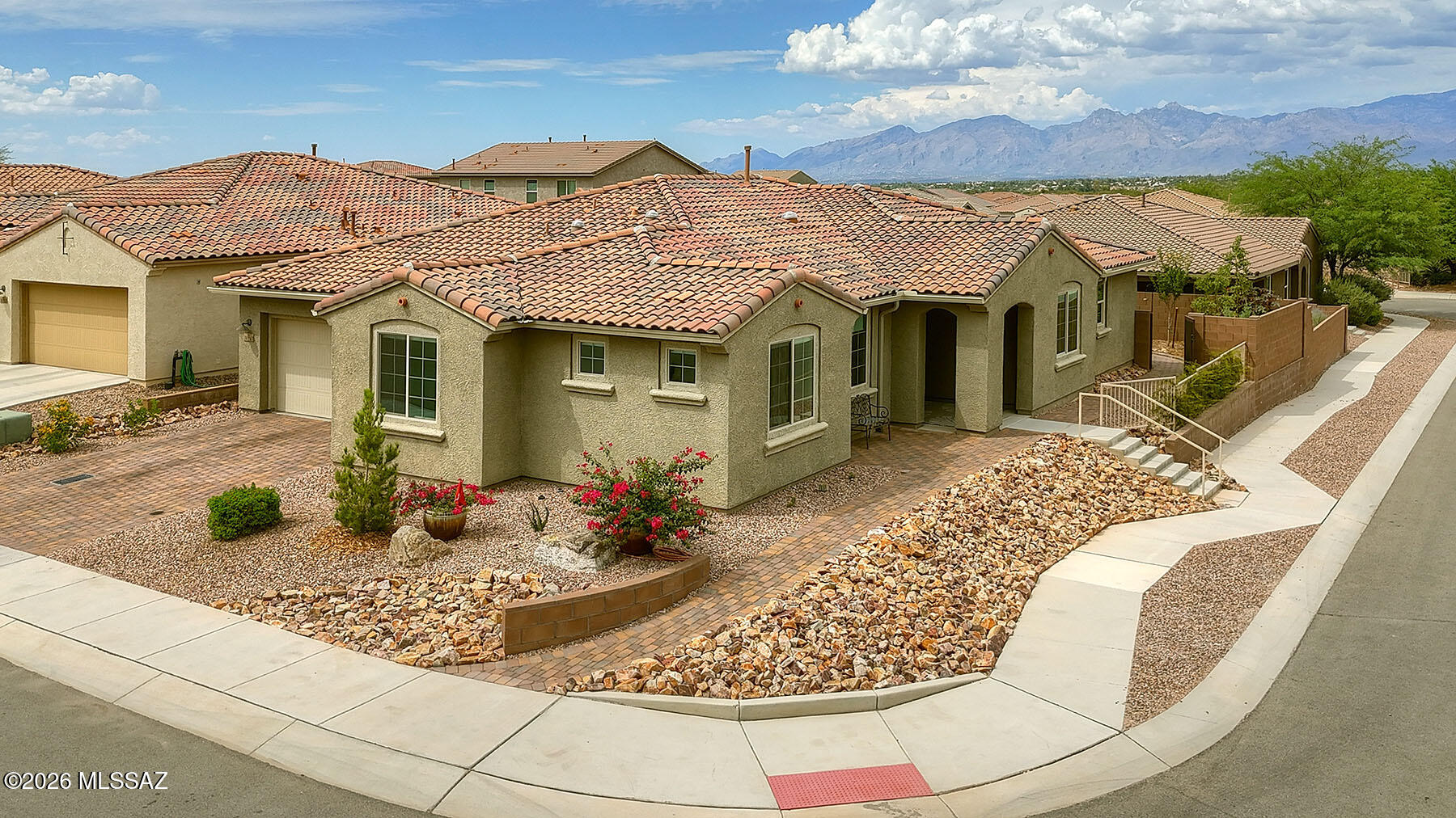 Welcome to this exceptional home nest nestled on a premium corner lot in the sought-after Saguaro Trails community. Built in 2020, this stunning 3BD/2.5BA residence, with a flexible office or optional 4th bedroom, features professional landscaping, an extended paver patio with built-in BBQ, fire pit, and luxurious Jacuzzi hot tub. Inside, enjoy an open great room design with 9' ceilings, designer finishes, upgraded chef's kitchen, quartz counters & custom California closets. Additional Upgrades include electric blinds, solar tubes, surround sound, water softener and 2-car garage with epoxy flooring. With top-rated Vail schools and numerous community amenities, including playgrounds, dog park, pool & splash pad, this home offers comfort, style, and convenience in one perfect package.