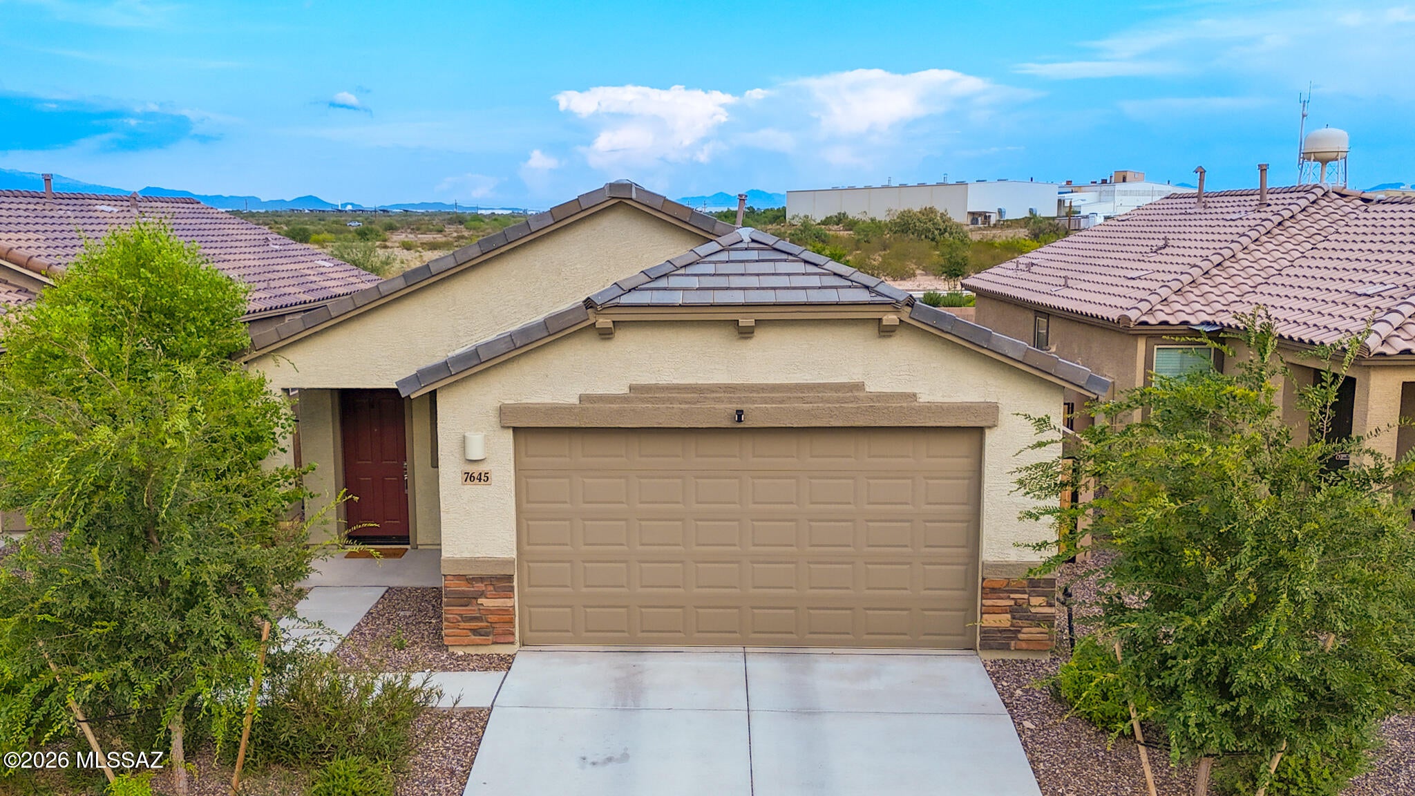 *VA Assumable for qualifed buyers!* 
Welcome home to this inviting La Estancia property featuring a bright, open layout perfect for everyday living and entertaining. The spacious great room flows seamlessly into the dining area and kitchen, complete with white cabinetry, stainless steel appliances, generous counter space, and a large breakfast bar. Neutral finishes and abundant natural light create a fresh, welcoming feel throughout. Step outside to a low-maintenance backyard with artificial turf and an extended patio, perfect for enjoying Tucson's beautiful views. 
 Conveniently located near shopping, dining, parks, this home offers comfort, convenience, and easy Arizona living.