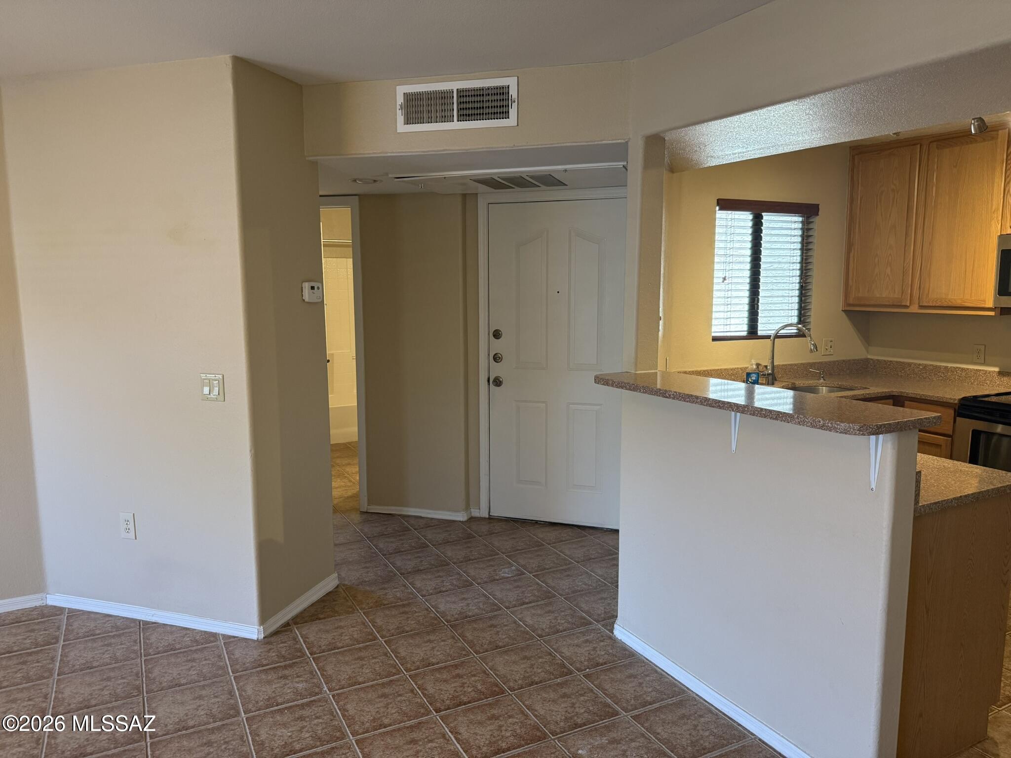 Enjoy resort style living near Ventana Canyon Resort and Sabino Canyon. This ground floor, split two bedroom/two-bathroom unit has a private patio, outside storage and walk-in closets. Interior boasts spacious great room living area. 24-hour gated community includes two heated pools with spas, fitness center, club house and mature landscaping. All in the shadow of the Catalina Mountains. Close to shopping, dining, hiking, golf +++!