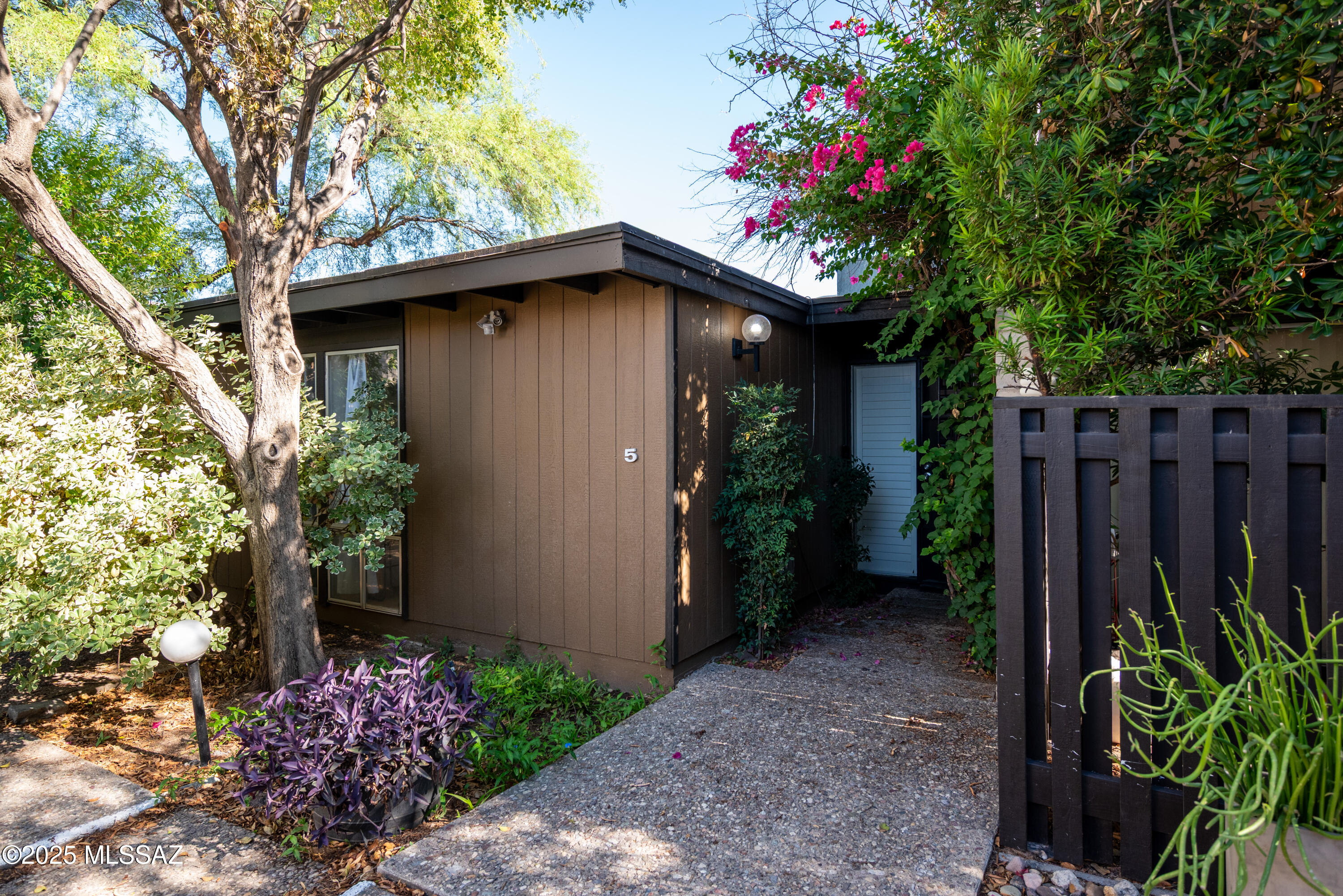 Charming Fully Furnished  2 bedroom, 2 bath townhome located in the highly desirable Orchard River right next to the Rillito Loop, Fort Lowell Park and Museum. Home features tile flooring throughout with plenty of living space. Kitchen includes Fridge, Dishwasher, Microwave, and Stove. Washer/dryer also included. Back yard is fenced and has a covered patio. There is a community pool for tenant use. It is close to shopping, restaurants, medical facilities, the loop and approximately 15-20 minutes from the UofA. This is a must see! Available as a short-term 1-month minimum Lease or as a long term lease. All utilities included. List price is average, please call for exact pricing and availability. Call to schedule a showing today!