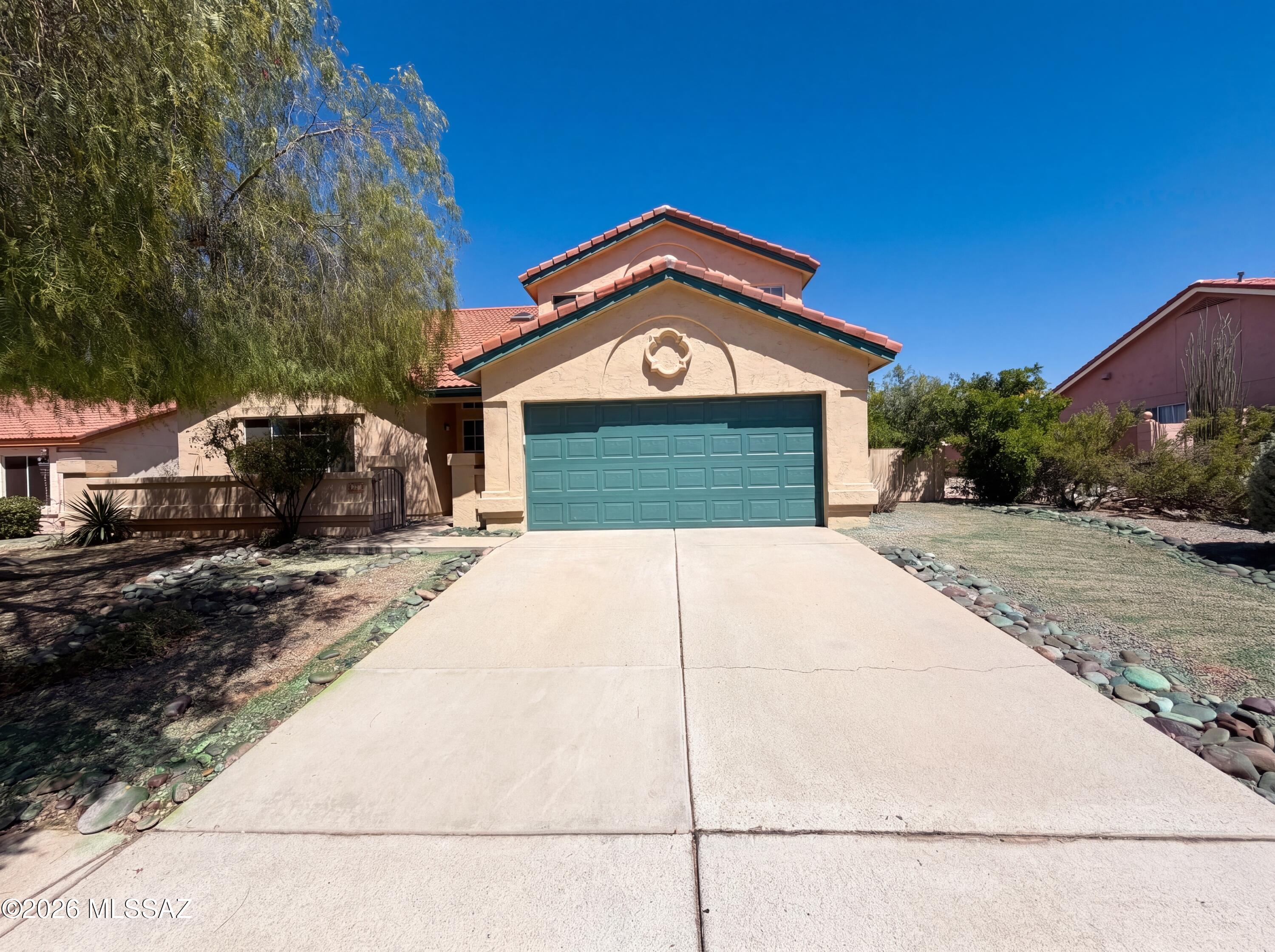 Welcome to 541 S Stoner Ave, refreshed by recent interior paint and partial flooring replacement. The interior features a fireplace and a kitchen with stainless steel appliances, while the primary bathroom includes double sinks and a separate tub and shower. A covered patio extends to a fenced-in backyard containing an in-ground pool. The property also includes a storage shed for your extra belongings. This updated residence with its delightful exterior is ready for you. Included 100-Day Home Warranty with buyer activation