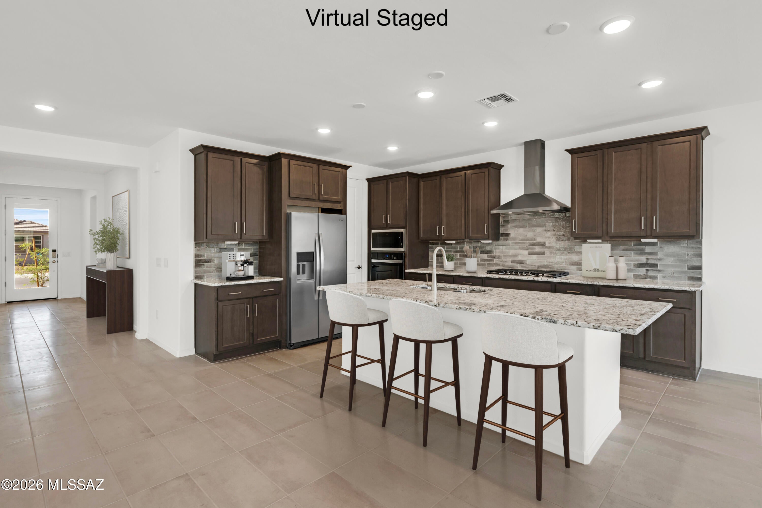 Auburn plan with Desert Modern elevation. Here the heart of your home seamlessly blends the living, dining, and kitchen areas. Enclosed den provides quiet area for work or study. The stylish kitchen boasts gas cooktop, granite countertops, center island & spacious corner walk-in pantry. Owner's suite features huge walk-in closet, vanity with twin sinks, linen closet & walk-in shower. Enjoy the pleasure of outdoor gatherings on the covered back patio which includes a gas BBQ stub-out. Includes 8' interior doors, Whirlpool Refrigerator, Washer/Dryer, faux wood blinds.