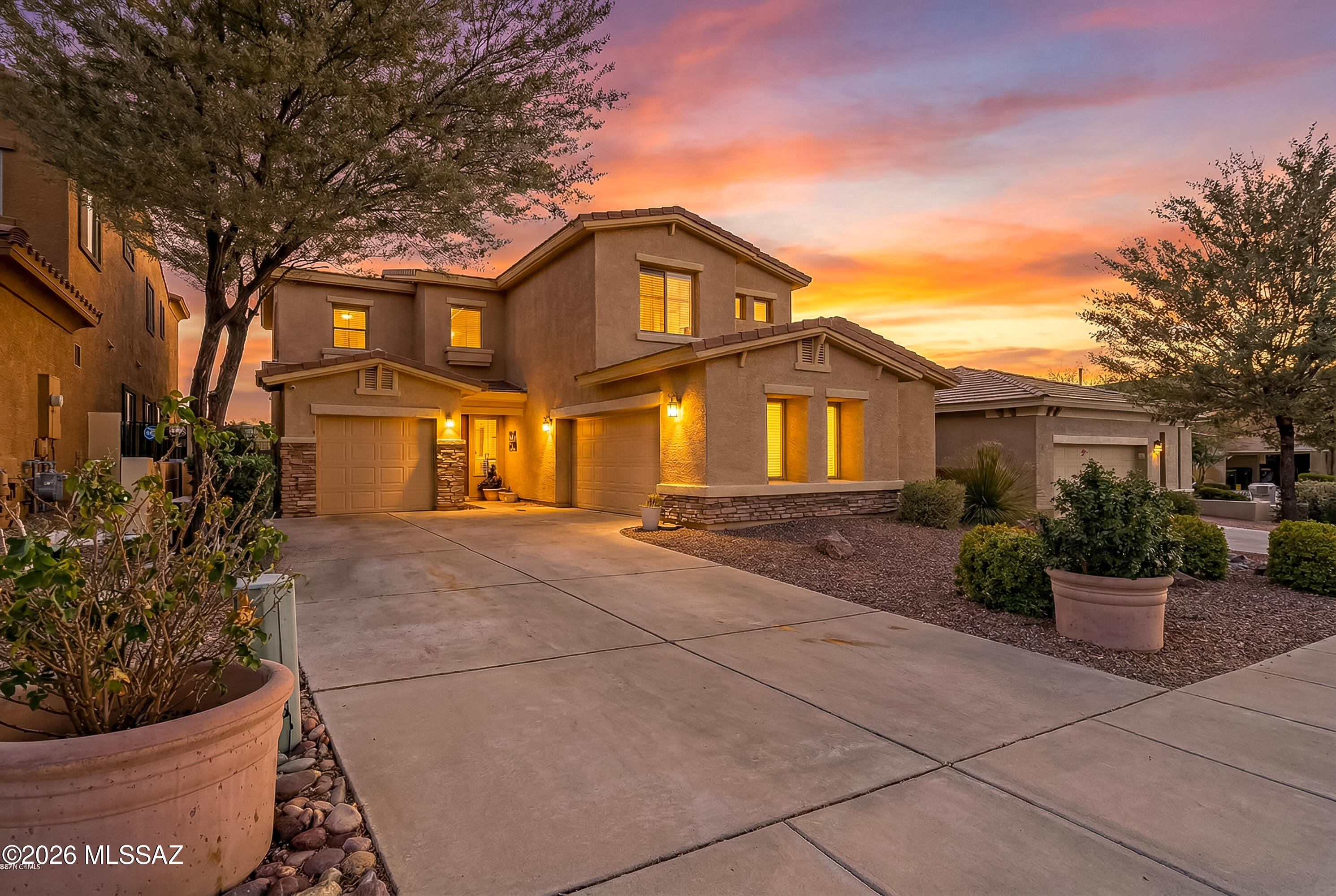 New Roof installed 3/26! Experience breathtaking mountain vistas from every angle in this stunning 4BR/3BA home in a prestigious Rancho Vistoso gated community. The light-filled interior boasts granite countertops, stainless appliances, and brand-new windows. A rare downstairs bedroom and bathroom provide the perfect setup for guests, while the spacious upstairs loft offers versatile living space. The primary suite is a true retreat, featuring a dual-vanity bath with a separate shower/tub and a private balcony with sweeping views. Step outside to an entertainer's dream backyard, complete with a gas fire pit, soothing fountain, and built-in natural gas BBQ. Ideally located near Oracle Rd, Oro Valley Marketplace, and top-tier dining. This is the lowest price per square foot in Rancho Vistoso
