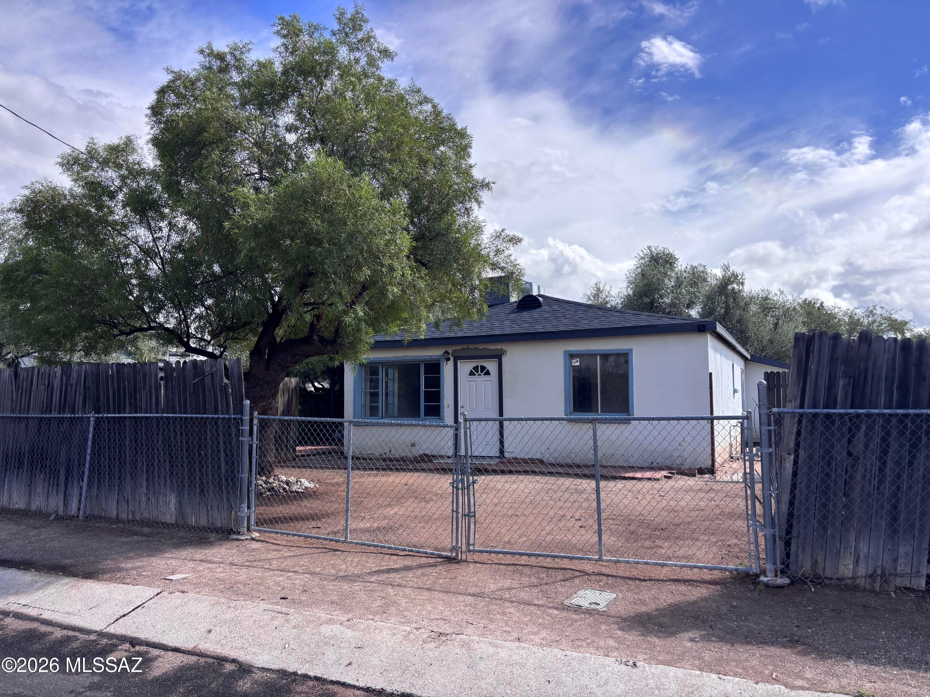 Great fix up opportunity!  R-2 Lot with 3BR/2BA house and 1BR/1BA guest house. Main house has nearly new roof and kitchen. Stainless appliances.  Home being sold as-is.
