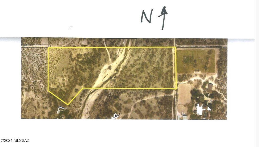 Where Nature becomes HOME with designated 6,000sf building area OUT OF FLOODPLAIN/RIPARIAN. Experience over 15acres ALL TO YOURSELF with Sabino Creek flowing through the east property blended with protection of surrounding NATURE CONSERVANCY land that protects the natural beauty from future development. A RARE opportunity to experience your own access to Sabino Creek!  Discover a rich diversity of native plant, animal life while taking in PANORAMIC views of the Catalina, Rincon mtns, all adding to a PEACEFUL AURA. Easy access to   Designated bldg area marked w/ ORANGE flags; PVC pipe w/ orange flags = possible best bldg site. All property corners are surveyed and marked.  Wire fence on approx north & west property lines. Old well conveys as-is. Septic req'd, no gas/wate