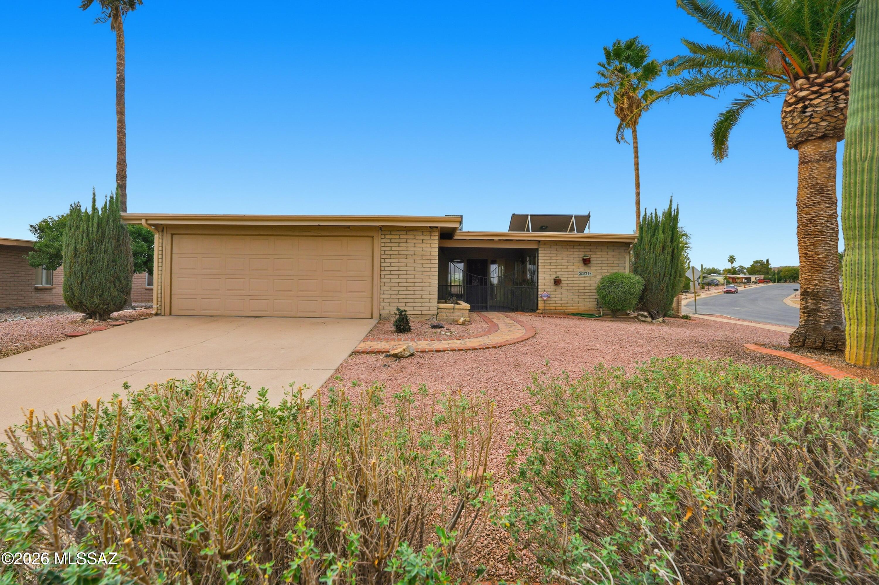 PRICE REDUCED FOR QUICK SALE!! GREAT FIND! 3 BDRMS, 2 BATHS, OVER 1,600 SF, ARIZONA ROOM  AND 2 CAR GARAGE, NO GVR BUT AVAILABLE! THE VILLAGES OFFER POOL, PICKLEBALLL AND OTHER EMENTITIES INCLUDED IN HOA! NEW $18,000 ROOF WITH WARRANTY! Located on a corner lot with open space behind and to the side. The Arizona Room extends across the entire back of home and adds lots of additional living space. New Heat Pump was installed 11/17 with 10 year warranty. Solar hot water heater 2008. New tile in living/dining area. This home needs some updating and TLC but WOW with the virws, the space and a 2 car garage - you won't find more bang for your buck!! A nice little place to create your new home! Escrow opened and pertinent documents with Gina Anderson Pioneer Title
Agent related to Seller