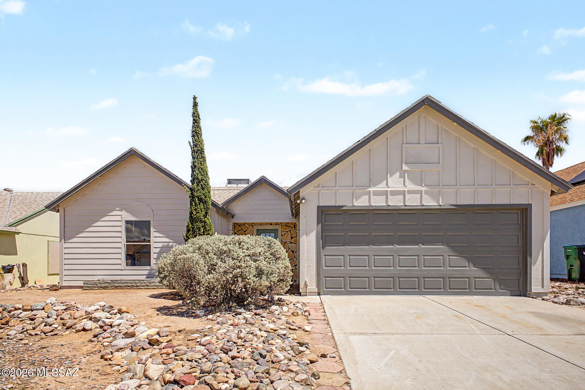 Seller will counter or accept offers between $299,000 and $309,000. Adorable move-in ready home in desirable Northwest Tucson! Beautifully updated with fresh interior and exterior paint, luxury wood-look plank flooring, and plush carpet in the bedrooms. Enjoy modern lighting and plumbing fixtures, stainless steel appliances, and refinished kitchen cabinetry. Conveniently located within walking distance to middle and high schools, with shopping, medical, and entertainment options just minutes away. The private backyard offers endless possibilities for outdoor living or customization. Benefit from energy-efficient solar, helping reduce utility costs and enhance sustainability, with a super affordable solar lease in place. A must see!