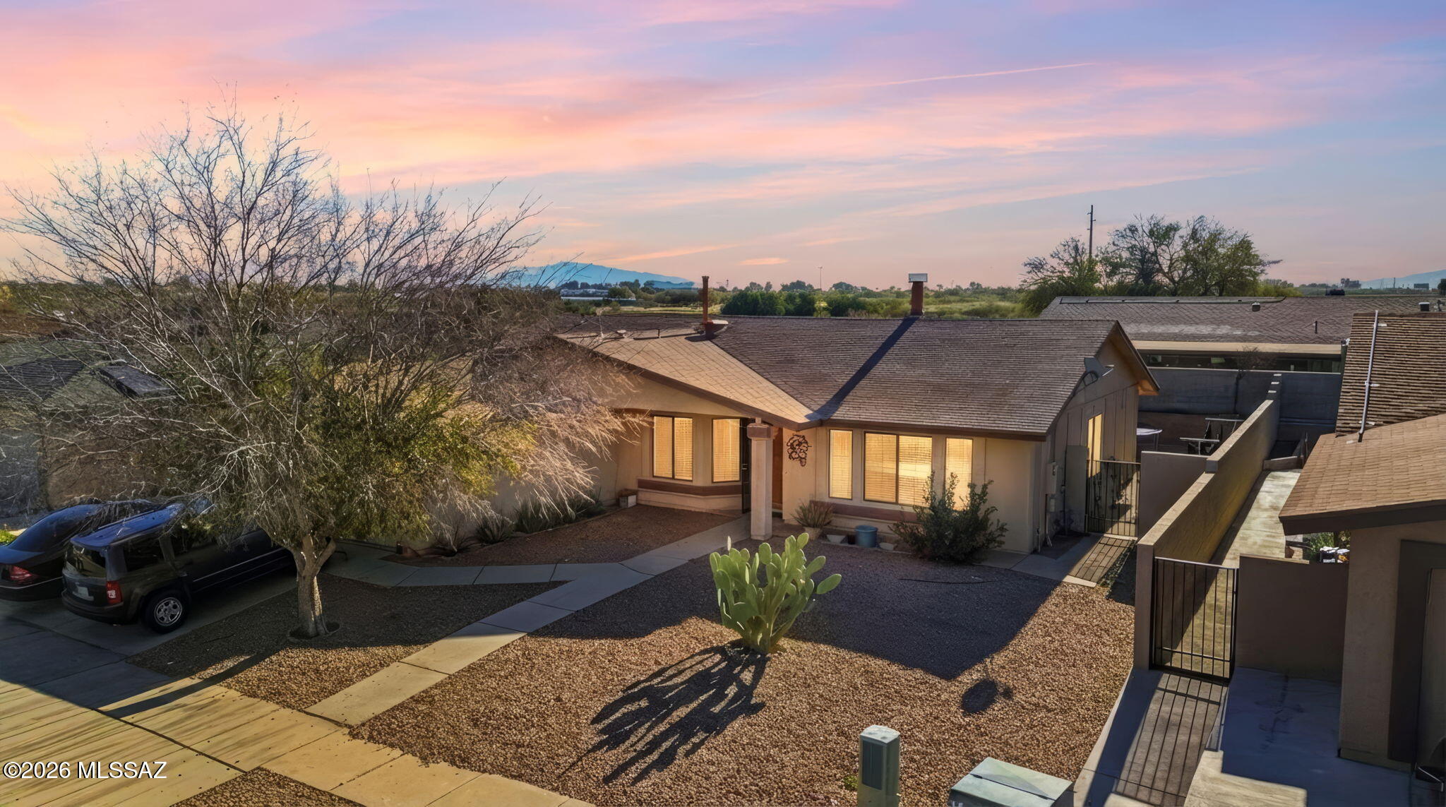 Welcome to this inviting 3-bedroom, 2-bath home at 5801 S Mahan Drive in Tucson, Arizona, where comfort and convenience come together. This well-maintained home features a bright and functional layout with spacious living areas and a cozy fireplace—perfect for relaxing evenings or gathering with family and friends. The kitchen flows seamlessly into the main living space, creating an ideal setup for everyday living and entertaining. The primary suite offers a private bath, while two additional bedrooms provide flexibility for guests, a home office, or growing households.

Located in a convenient south Tucson area, you're just minutes from shopping, dining, and entertainment at Tucson Spectrum and Park Place Mall. Enjoy outdoor recreation at Reid Park or explore the scenic beauty of Saguaro National Park. Plus, you're within easy reach of University of Arizona and major roadways for a smooth commute.

Whether you're a first-time buyer, downsizing, or investing, this home offers warmth, charm, and a prime Tucson location. Don't miss this opportunity!