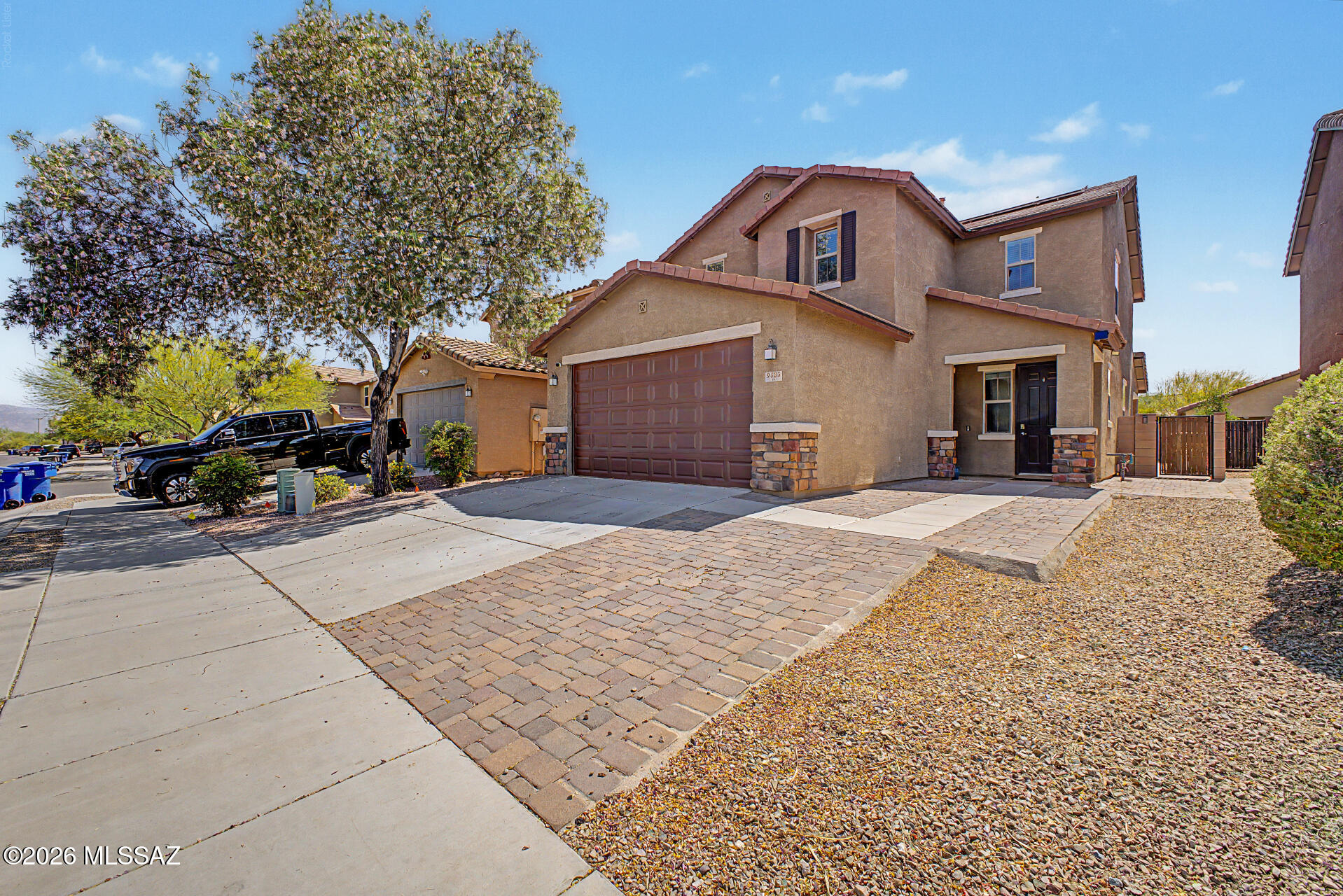 Fall in love with this charming two-story home with a great curb appeal and a 2-car garage! Inside, you'll be welcomed with a spacious layout perfect for entertaining and relaxation, featuring soft carpeting underfoot, tile in high-traffic areas, abundant natural light, and neutral paint that complements any decor style. The well-appointed kitchen boasts ample cabinetry, plenty of counter space, a breakfast bar, and built-in appliances for a seamless cooking experience. The airy main bedroom promises a good night's sleep, including a full bathroom with dual sinks plus a practical walk-in closet. Flexible loft providing the perfect spot for a home office or hobby area. ASSUMABLE VA LOAN is an option!!! The backyard hosts a covered patio perfect for morning coffee and peaceful evenings, ample seating with pavers, a fire pit for nights under the stars, and a hot tub for a relaxing time. Check it out before it's too late!