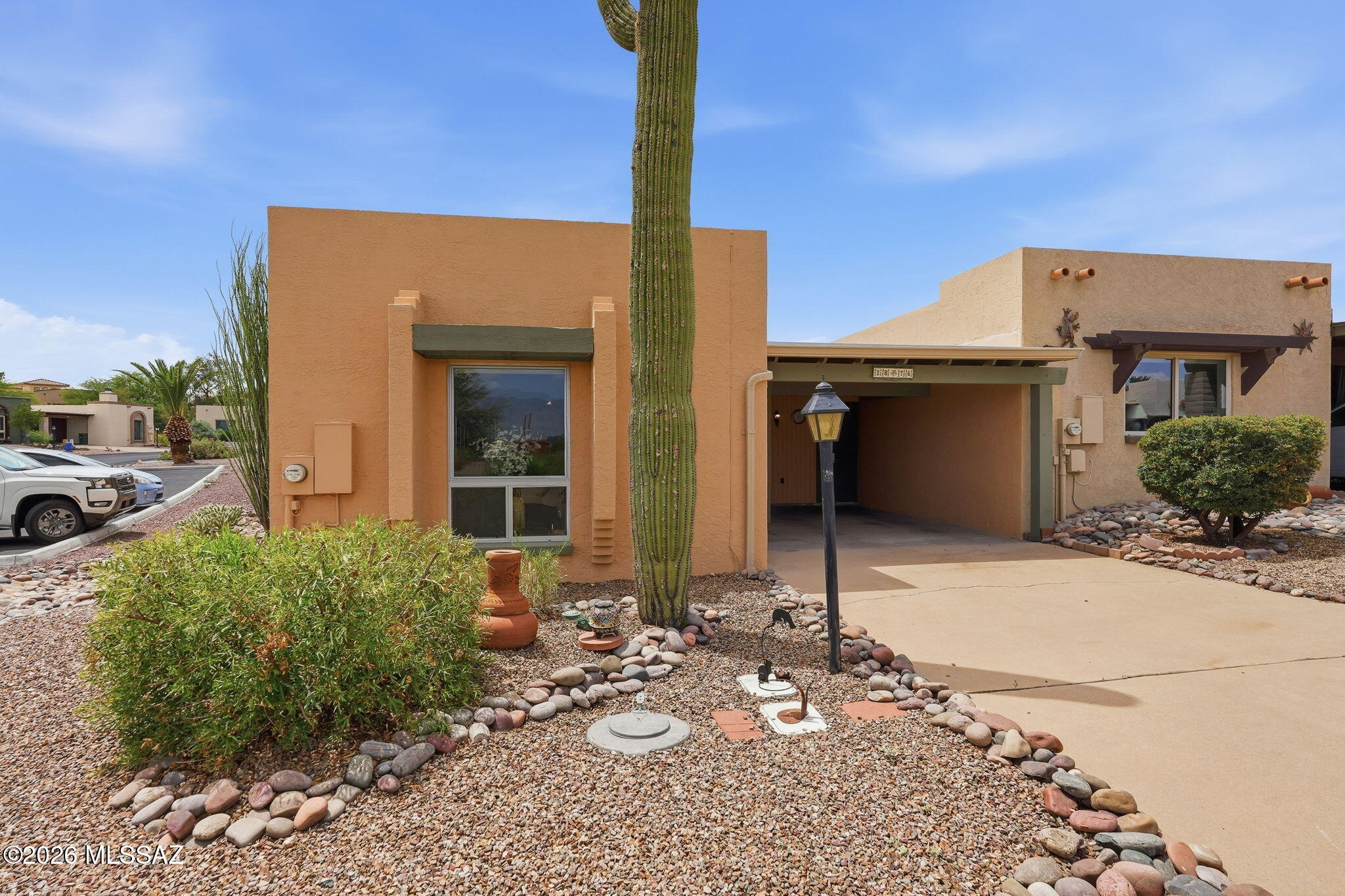 Highly motivated seller! Sun-filled end-unit townhome with Santa Rita Mountain views, exceptional updates, and move-in-ready quality. Rarely does a Desert Hills II home combine this level of natural light, thoughtful improvements, and pride of ownership. The end-unit location provides six windows--double that of many interior units--fill the home with natural light throughout the day while framing beautiful mountain views from the living room.
Major investments have already been completed, including a new roof and gutters (2023), new elastomeric exterior coating and paint (2023), a rooftop HVAC system with smart thermostat (2021), and a long-term termite warranty. The result is a home designed for comfortable, low-maintenance living. The remodeled kitchen blends functionality with European-inspired design, featuring custom cabinetry, granite countertops, pull-out shelving, a dedicated pantry, pot-filler over the range, floating display shelves, updated lighting, and newer appliances. Throughout the home you'll find ceramic tile flooring, Hunter Douglas window coverings, custom built-in bookcases, Kohler fixtures, decorator lighting and switches, and quality finishes that reflect meticulous care.
The enclosed Arizona Room extends the living space and provides direct access from the primary suite, creating an ideal setting for relaxing, reading, hobbies, or a home office. Outside, enjoy a spacious private courtyard, two large exterior storage rooms, a covered front entry, and the convenience of adjacent guest parking for family and friends.
Quality furnishings, appliances, and household items are available, making this an exceptional opportunity for buyers seeking an easy transition to Green Valley living.
Located within Desert Hills II and Green Valley Recreation, you're just a short walk to the Desert Hills Recreation Center with pools, tennis, fitness facilities, arts studios, and social activities, while the Desert Hills Golf Course is just around the corner.
If you're looking for a bright, beautifully maintained home where the major improvements have already been completed, this exceptional end-unit delivers comfort, convenience, and the easy lifestyle that makes Green Valley one of Southern Arizona's premier active-adult communities.
