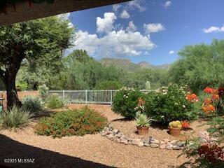 Fully Furnished vacation rental with incredible mountain views and community pool access.  This single level 3 bedroom 2 bath home is located near Sabino Canyon Recreation Area with Southwest flair and plenty of upgrades. Kitchen features granite tile counters & stainless steel appliances. Master bedroom features a king size bed, master bath with double vanity sinks & walk-in shower. Queen bed in the guest bedroom and third bedroom set up as an office w/desk, printer, sofa & air mattress. Wonderful back patio area to enjoy the views with outdoor speakers and custom outdoor lighting plus BBQ grill plus a community pool.