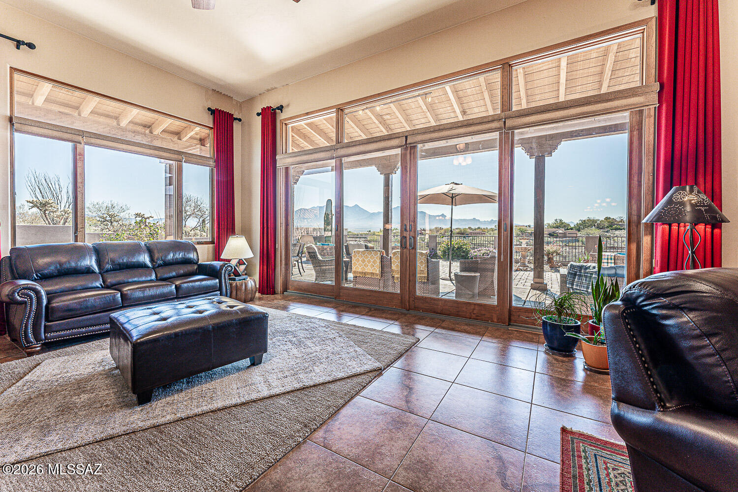 Honestly - Mountain View from entire great room, breakfast table, Primary suite and Casita. Needless to say entire rear patio. Quite possibly the best view in Green Valley!  Alfresco dining at it's best....Stepping inside, the Santa Rita Mountains are ever present to take your breath away! NON-AGE restricted, Gated community. The great room and kitchen have wonderful windows to the VIEW, natural light and wooden beams and alder wood 
cabinetry add drama.

Step into your chefs kitchen with granite counters with ample storage natural wood cabinets flanking the room. Beams enhance the beauty of the kitchen. A separate dining area with indirect/direct lighting, along with the glowing fireplace add to the ambience. The resort style back patio with fire-pits both wood and gas and built in seating, perfect for entertaining or just relaxing. Same beautiful view from primary suite and casita. Not age restricted. Has GVR. Most furniture available with qualified offer.