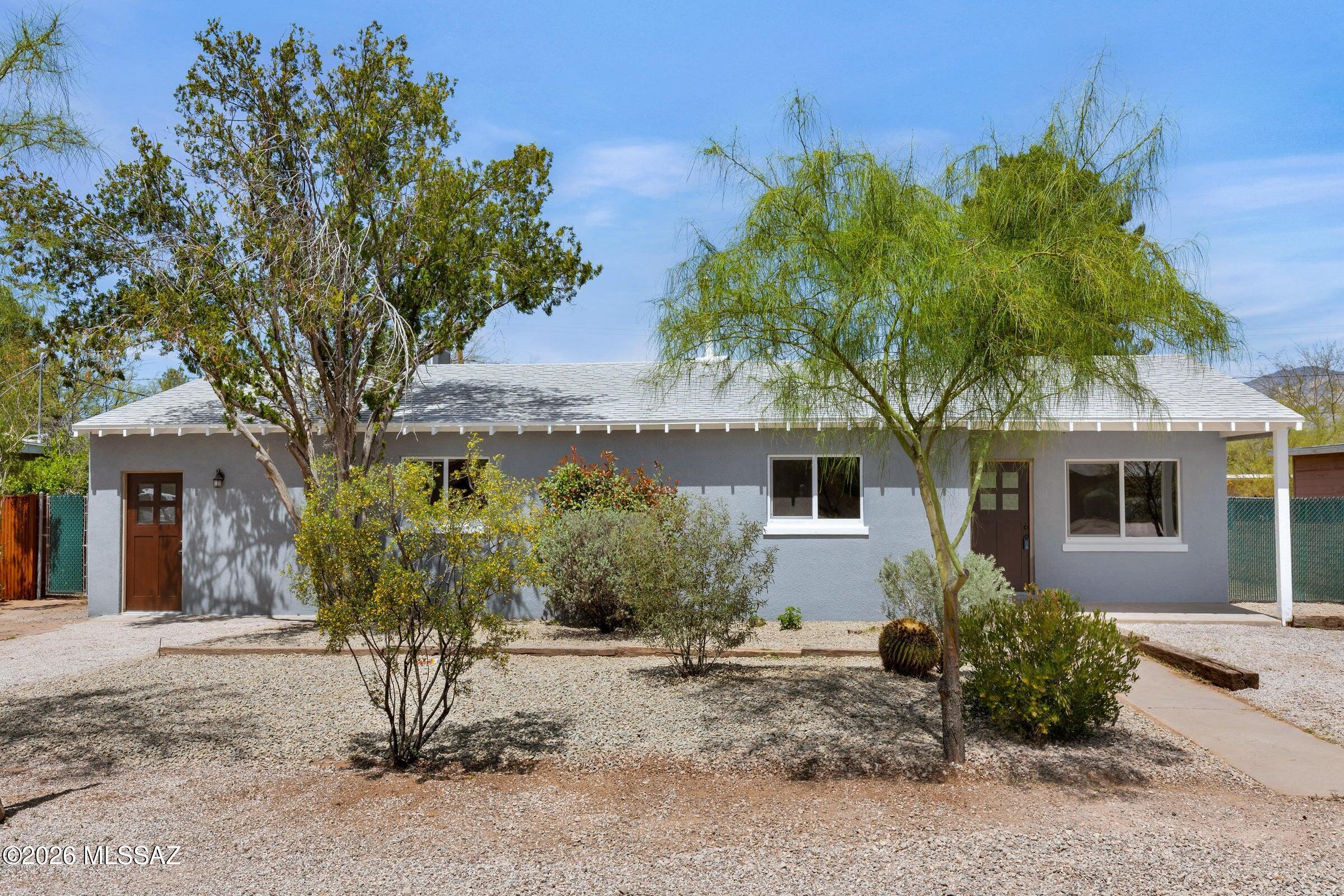 Gorgeous Midtown Rental Home, Moments Away from Historic 4th Ave, UofA, Banner Medical & Popular Tucson Eateries & Establishments. Charming Original Rustic Wood Beam Ceilings & Comfortable Floorplan w/ Flexible Living Spaces. Enhanced w/ All New Wood Look Flooring, Redesigned Kitchen w/ White Shaker Cabinets, Black & White Granite w/Backsplash & Stainless Steel Appliances. 4 Generous Bedrooms w/ 2 Beautifully Remodeled Bathrooms w/Private Entry to 1 Room. Bathrooms Feature Custom Tiled Shower/Baths, Lighting & Lovely Vanities. Enjoy Summer Nights on the Relaxing Front Porch or Expansive Back Patio. Friendly & Quiet Neighborhood on Dead End Street w/ Little Traffic. 1 yr Lease. Tenant pays utilities. Pets must be approved. Call to schedule a showing today!