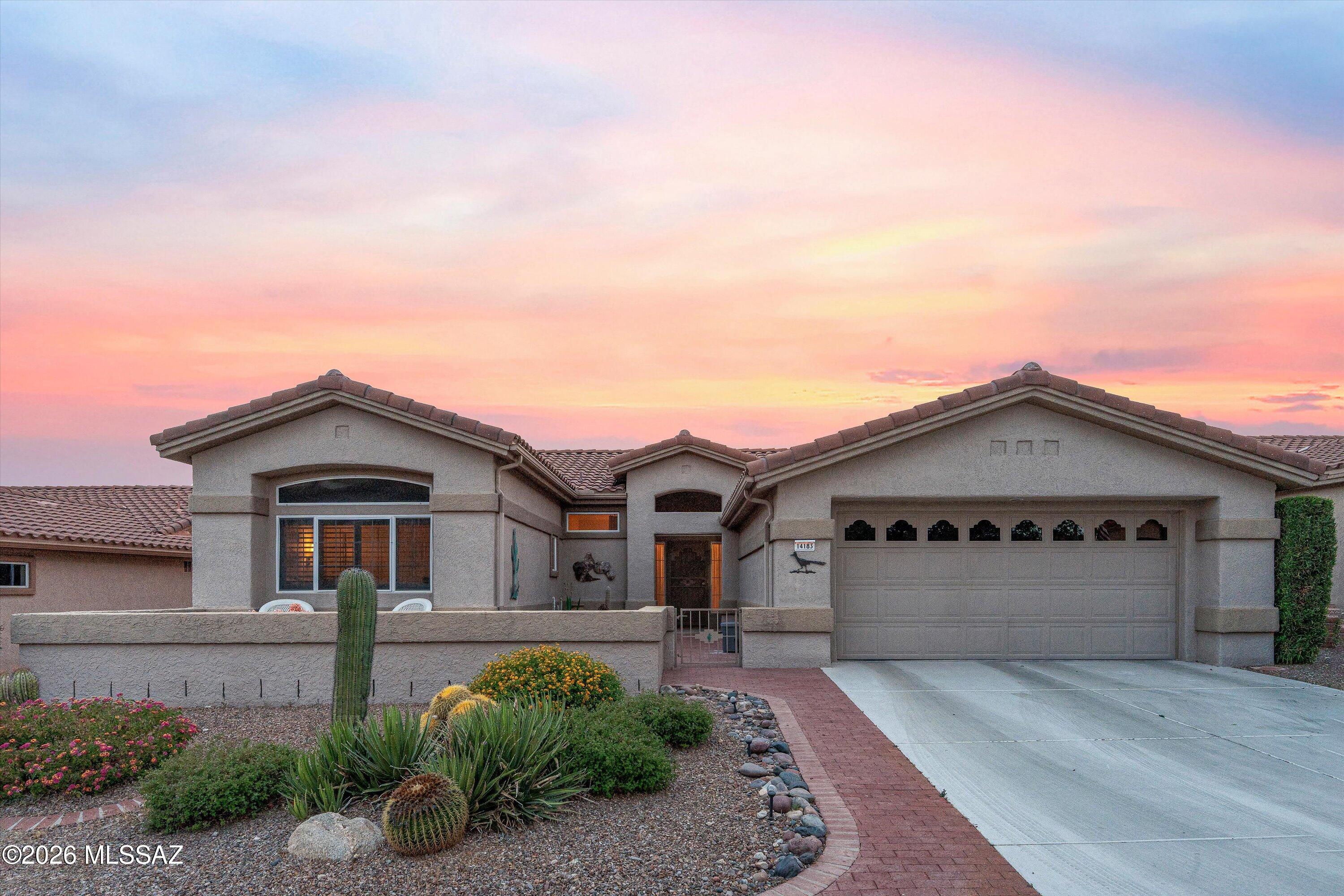 Desirable Windsor Model 2BD/2BA +Den in desirable Sun City. Spacious open living room, high ceilings, freshly painted inside, large picture windows, oversized dining area, 16 X 16 tile in all traffic areas, Chef's kitchen, wraparound counter, oak cabinetry, built-in wine rack, Corian counter-tops, breakfast bar, sitting area/TV room with fabulous view to common area.  Master Suite with a large bay window with built-in storage, access to a covered patio, 2 master closets, and an upgraded shower. Den with two custom-built-in desks, plenty of room for working or crafting. Backyard features an extended patio with a pergola awning, backs up to a common area, and has views. The Courtyard has fabulous views of Pusch Ridge. Retirement Golf community, which is highly sought after.