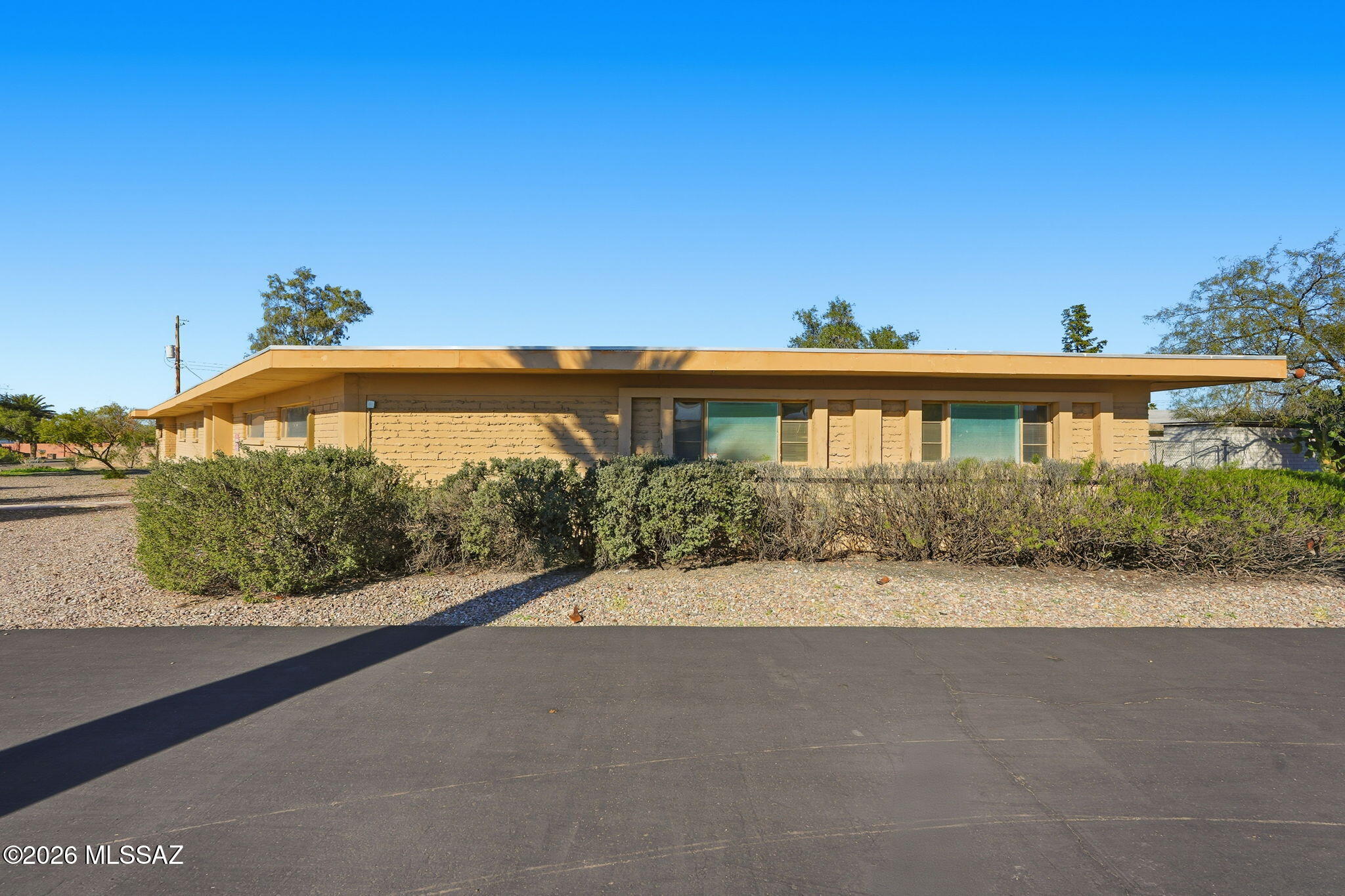 Rare Central Tucson Fix-Up & Investment Opportunity! Huge .67-acre city lot packed with potential in a convenient location. This 3-bedroom, 2-bath home plus add'l shower room is ready for renovation, flip, expansion, or a complete reimagining. Large lots like this are increasingly hard to find and offer exceptional flexibility for investors, builders, flippers, or buyers seeking value-add opportunity. Expansive rear yard plus additional side/back yard area with double gates provides room for RV parking, storage, workshops, entertaining, or future improvements. Minutes from shopping, dining, parks, & everyday conveniences. Buyer to verify zoning, uses, & deed restrictions with the City of Tucson. Property sold AS-IS. Listing agent is related to a member of the board of seller.