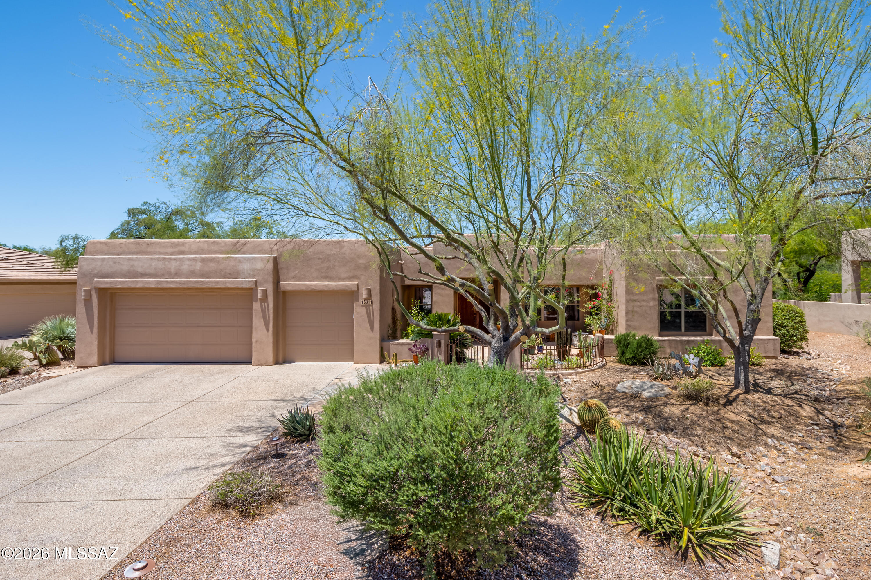 Open House - Sat 6/06 & Sun 6/07 - 10-1pm. Elegant Southwestern living in Oro Valley! This spacious 4 bd - 3 ba home with den/office & 3-car garage offers a thoughtful floor plan with formal living and dining areas, a warm family room with fireplace, and a kitchen designed for gathering with generous cabinetry, granite counters, gas cooktop, and casual dining overlooking the backyard. A welcoming courtyard entry sets the tone, surrounded by mature desert landscaping and inviting curb appeal. The private backyard features a covered patio, pool, lawn area, and lush plantings - perfect for relaxing or entertaining. Primary suite includes a beautifully updated bath with dual vanities and a walk-in shower. Check out additional documents for upgrades/amenities list in this well maintained home.