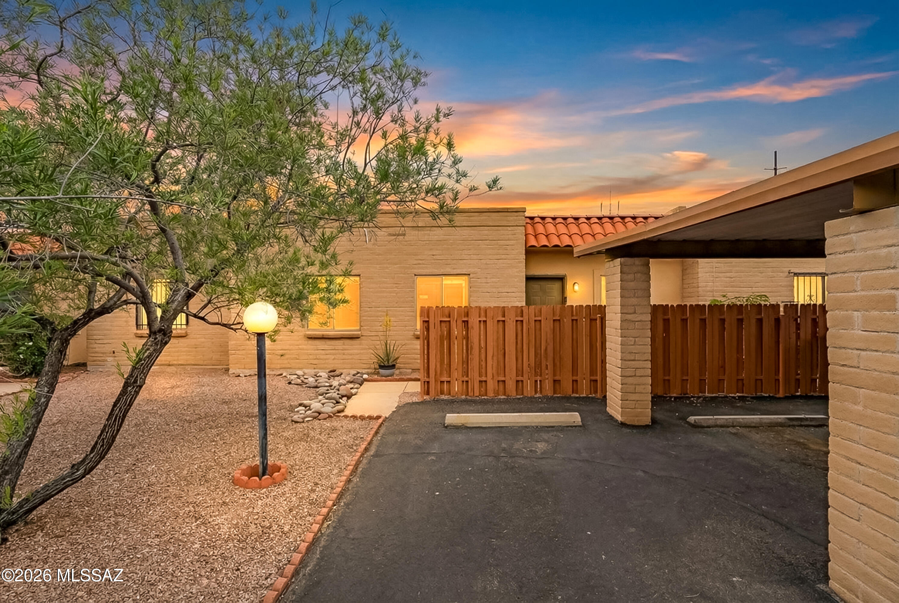 Beautifully updated 3 bedroom, 2 bath townhome in the desirable Pantano Park Townhomes! This move-in ready home features a stunning updated kitchen with newer cabinetry, granite countertops, and sleek black appliances including range, microwave, and dishwasher. Both bathrooms have been fully remodeled with new vanities, matching granite surfaces, and custom tile showers. Enjoy fresh interior paint, new doors, and modern lighting. Step outside to a private backyard with additional storage, perfect for relaxing or entertaining. Two assigned parking spaces, including one covered, add convenience. Community amenities include a pool, pickleball, tennis, walking paths, and direct access to The Loop. Ideally located near shopping, dining, and schools--this one checks all the boxes.