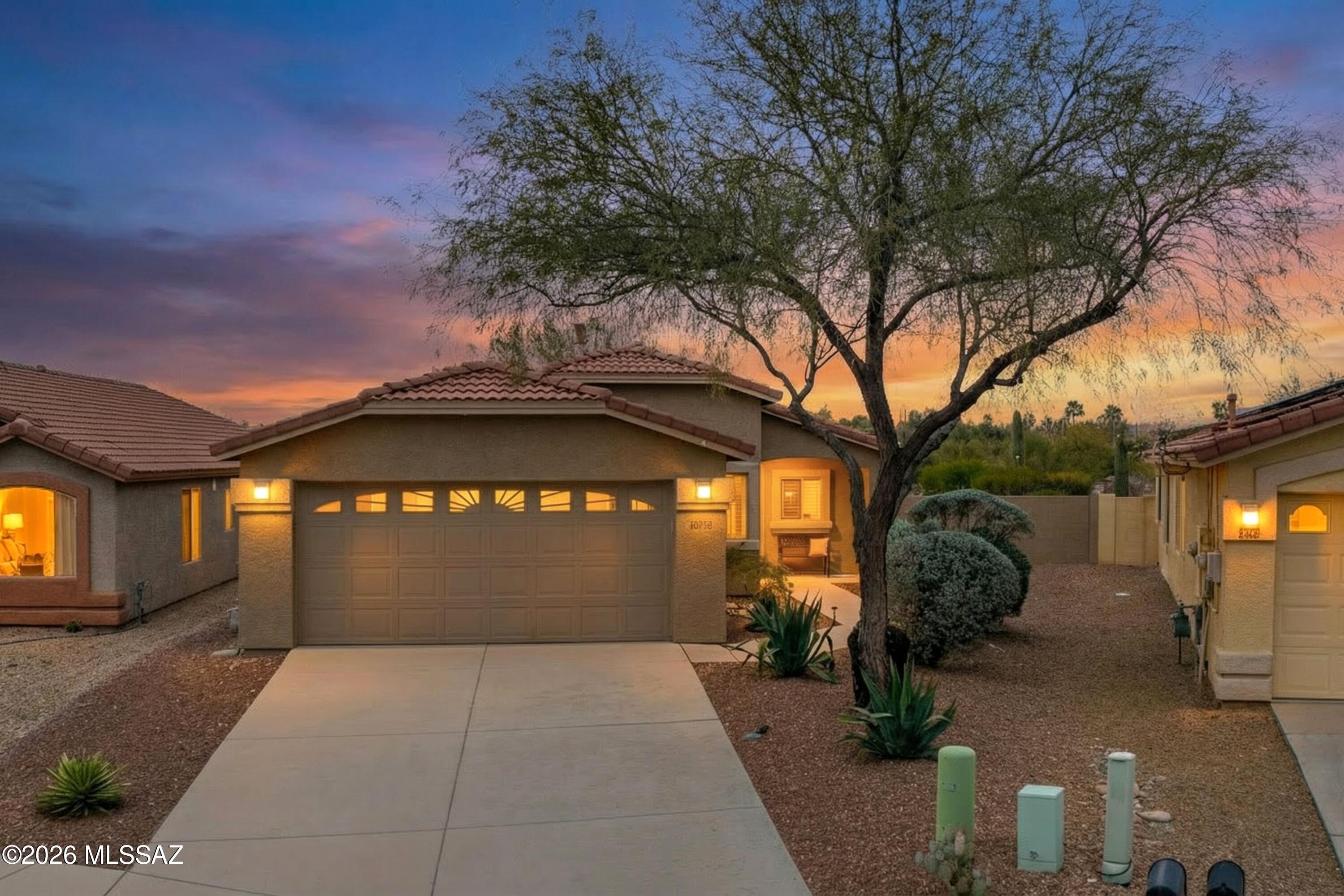 A Place To Call Home - a home in pristine condition with a great floor plan, privacy, pool and spa, beautiful desert and beautiful views of the Catalina mountains - you have found it.
The heart of this home and the place you will live in is the wonderful family room with windows overlooking the pool &  lovely views of the Catalina mountains. This home backs up to five HOA owned acres of pristine Sonoran desert that insures both privacy & views. Inviting primary ensuite w/ a large shower & big walk-in closet, split bedroom plan allows for quiet and repose. It's hard to believe that this small, quiet neighborhood tucked away from the noise and bustled of Oracle Road is just minutes from Whole Foods, Sprouts , Wildflower and also not far from La Encantada and its offerings. Only 20 minutes to the University.