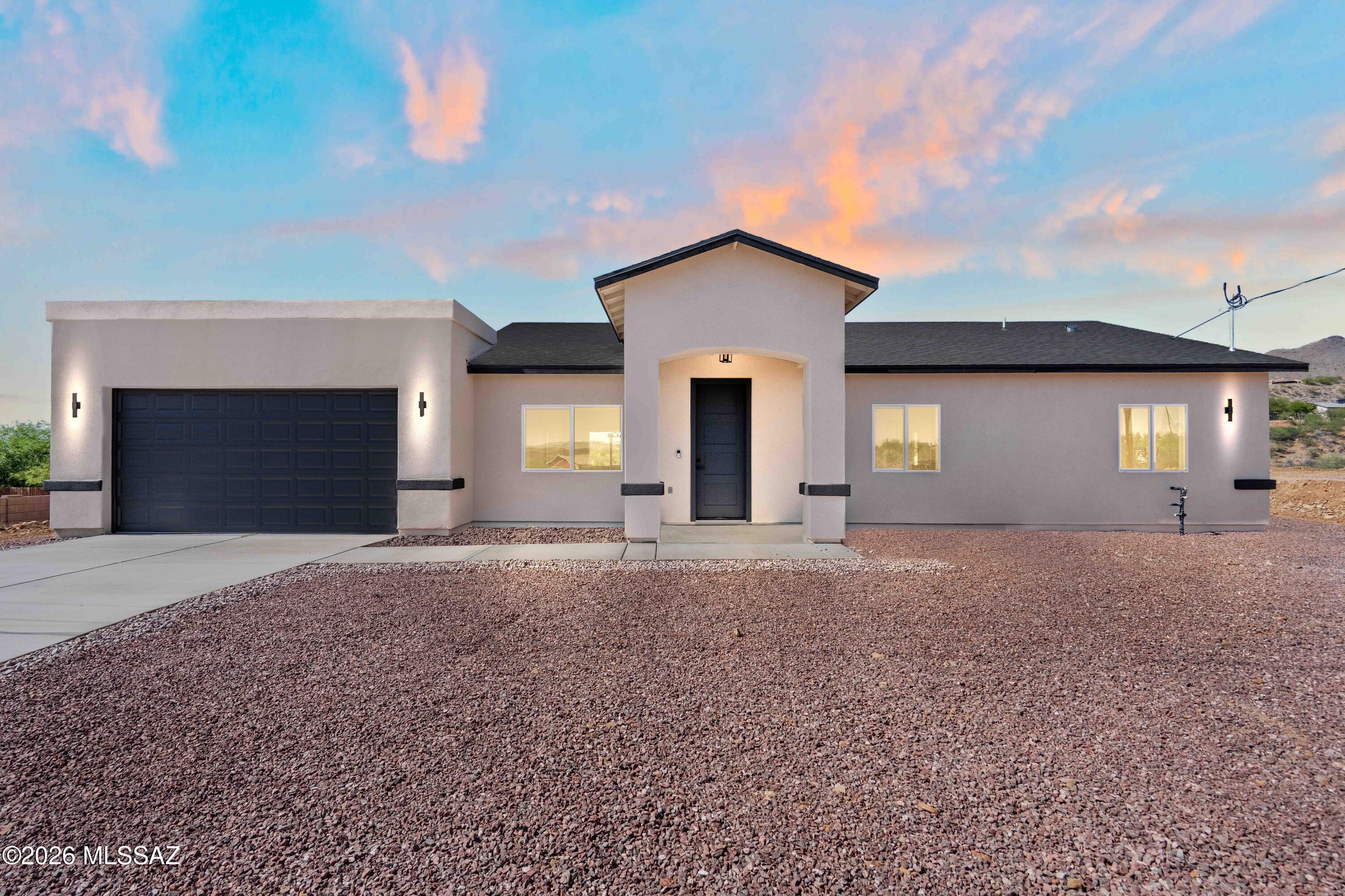 Perched on a scenic hillside, this 3-3-bedroom, 2-bathroom home offers 1,632 sq ft of modern living with breathtaking mountain and city views. The elevated lot provides privacy while showcasing sweeping vistas from multiple areas of the home. Inside, clean lines and contemporary finishes define the space, including quartz countertops and large-format 24x48 ceramic tile flooring for a sleek, low-maintenance feel. The open layout seamlessly connects the kitchen and living areas, ideal for everyday living and entertaining. With its blend of style, function, and unbeatable views, this hillside property offers a rare opportunity for refined living. 

OWNER/AGENT