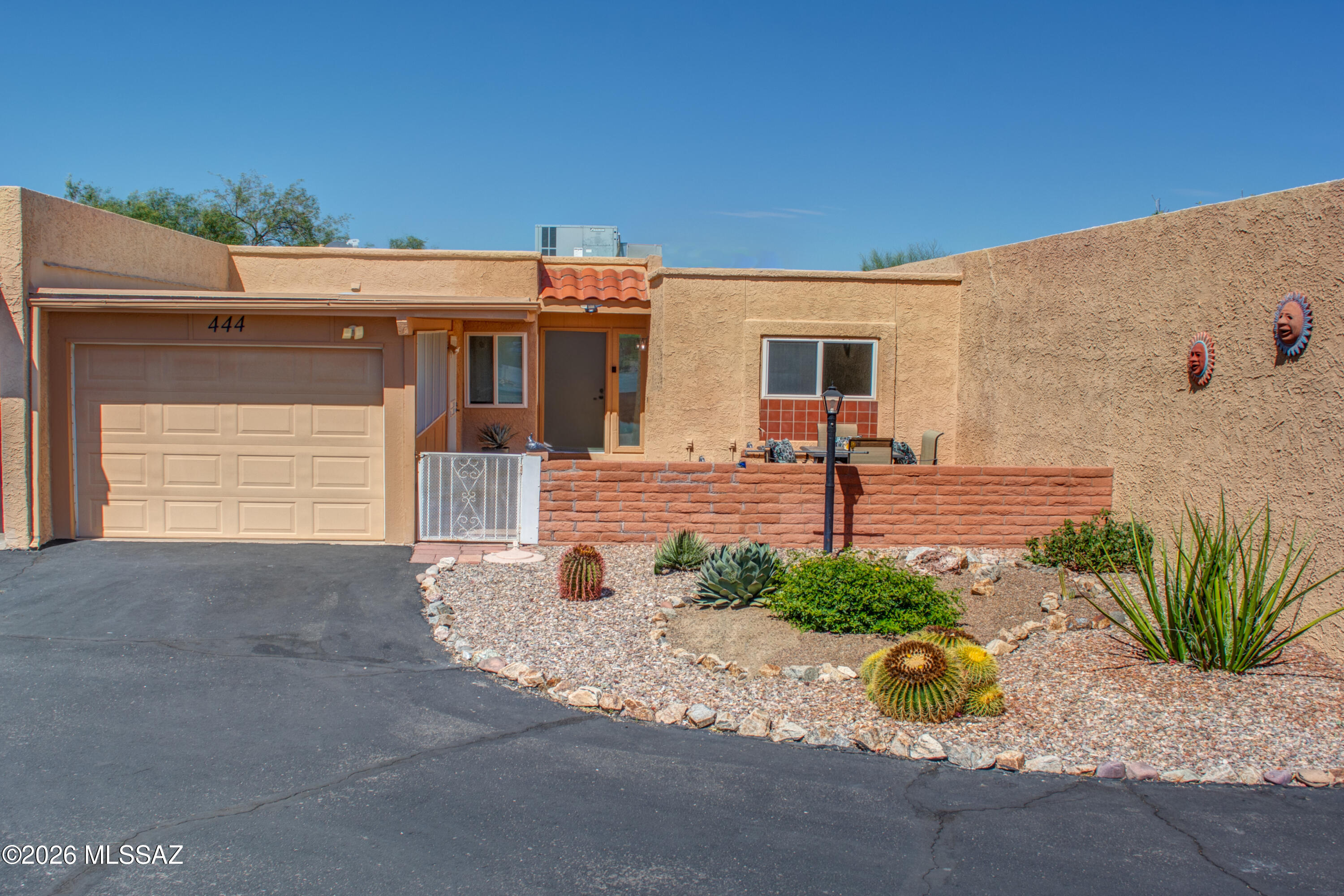 Discover carefree living in this 2-bedroom/1-bath townhome offering 1,048 sq ft of thoughtfully designed space. With all major updates already complete--roof replaced in 2021, HVAC in 2020, water heater in 2024, plus Pella patio doors and more--you can simply move in and start enjoying the relaxed desert lifestyle. Step into your screened Arizona room and soak in stunning mountain and desert views with complete privacy--no rear neighbors to interrupt your serene vistas. Three outdoor spaces (screened AZ room, front and back patios) offer year-round Arizona indoor-outdoor living. The low-maintenance design means more time for what matters--perfect for lock-and-leave flexibility. One-car garage adds convenience. The Villages of Green offer their own Rec center with pool, spa, tennis/pickleball, artist studio/kiln and many activites. GV rec is available but not required!