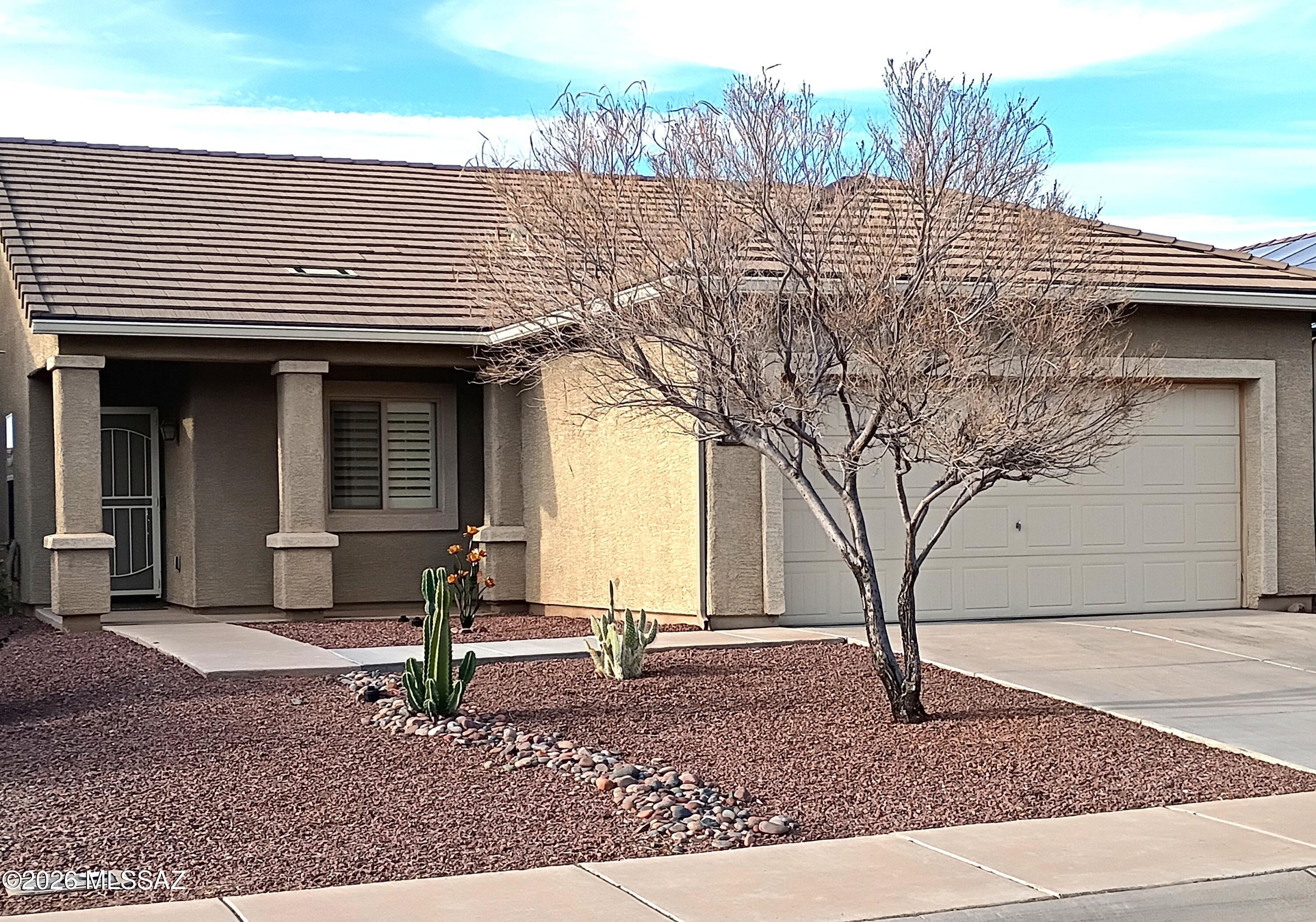 Welcome Home! We are freshly painted on the inside and ready for you to move in, including the children's play set. Beautiful kitchen with new stainless-steel appliances. Nice sized bedrooms with full sized closets in each bedroom. Seller is leaving the refrigerator, washer and dryer. Great community with pool, splash pad, Tony Hawk designed skate park, baseball fields, basketball and volleyball courts and jogging path. Close to shopping and I-10 access.