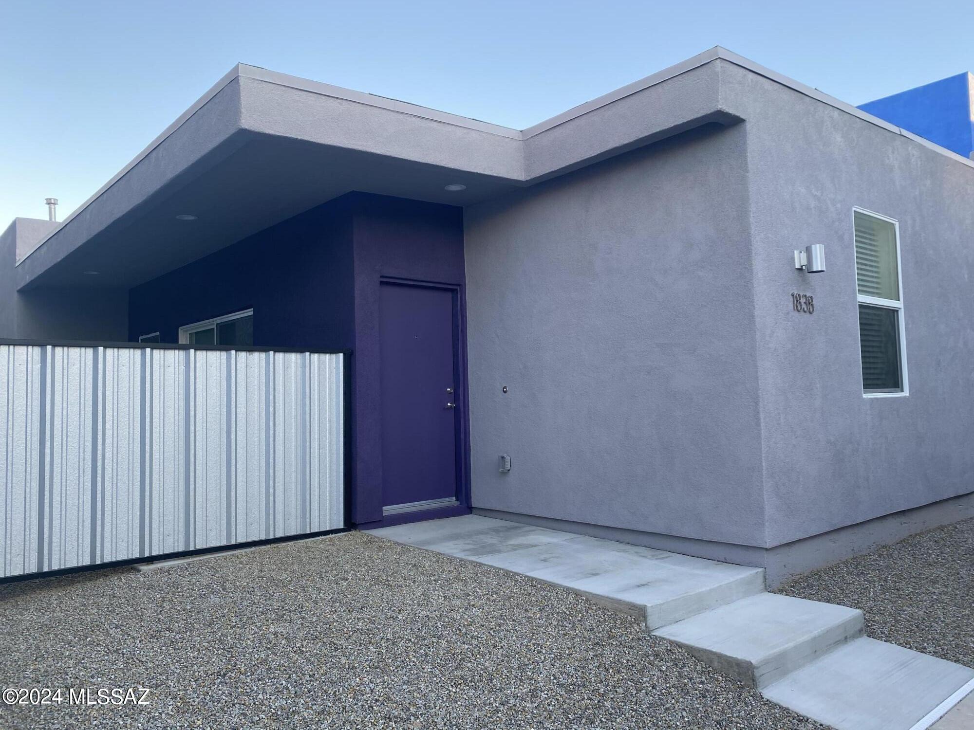 Sleek, Modern, Brand New Build.  2 Br 2 Ba with side yard. High efficiency windows and insulated walls. 2 car garage. All new appliances included. Granite countertops. Stack washer and Dryer included.. Interior Home off main roads.  Central AC.