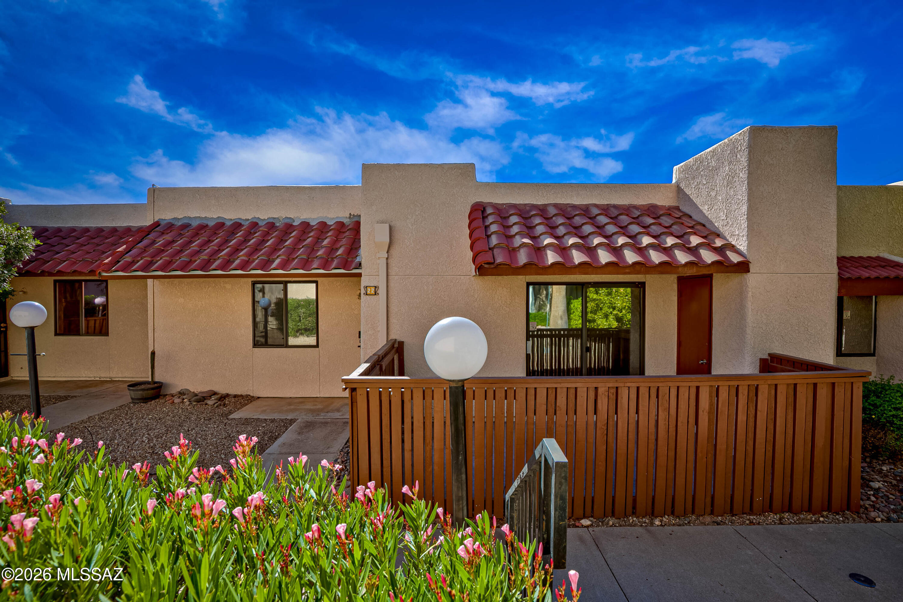Charming 2 bed, 2 bath single-story condo on Tucson's desirable eastside! This well-maintained home features a functional split floorplan, offering privacy and comfortable living. Enjoy updated bathrooms, newer flooring, and a newer AC/heat unit for added efficiency and peace of mind. Ideally located directly across from the community pool, spa, and rec room--perfect for relaxing or entertaining. Cute private patio adds the perfect outdoor space. Quiet setting with convenient access to shopping and dining. Move-in ready and a must-see--ideal for full-time living, a winter getaway, or investment property! BRAND NEW CARPET in both bedrooms!