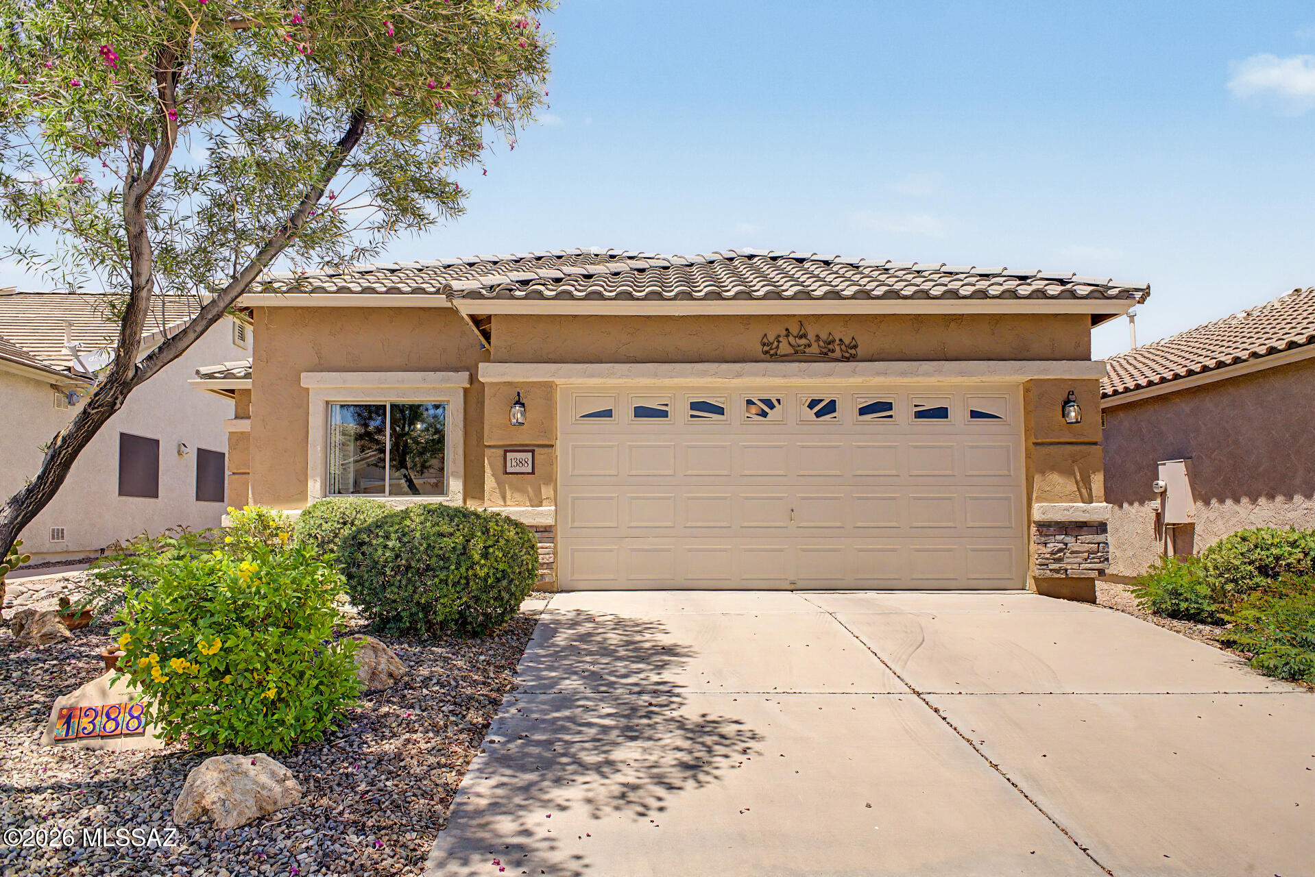Experience resort-style living in Rancho Resort, a highly sought-after gated 55+ active adult community in Rancho Sahuarita. 
Meticulously maintained and showcasing pride of ownership throughout, this move-in ready 2-bedroom, 2-bathroom, 1,800 sq ft single-family home features a fully remodeled kitchen with granite countertops and updated appliances, elegant porcelain tile flooring, and an updated master bathroom with a luxurious walk-in shower. Relax in your private backyard oasis complete with professional landscaping, vibrant flowers, mature plants, desert cacti, and a tranquil water feature. Additional features include a water softener system and numerous thoughtful updates. Perfect for retirement living, year-round living, or a seasonal retreat. Seller willing to provide a 1 year home warranty.