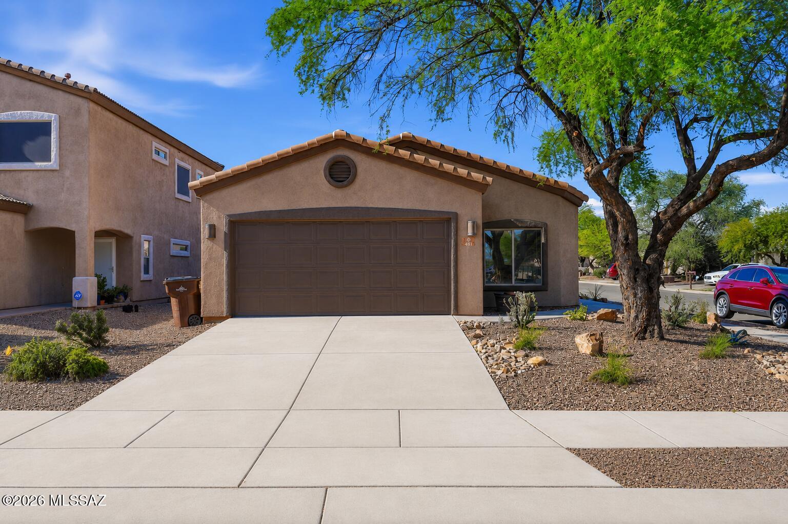 Discover effortless Arizona living at 481 E Placita Rejilla! Perfectly positioned on a desirable corner lot, this beautifully maintained home welcomes you with an airy light filled interior and brand new warm, neutral carpeting that compliments any style. The refreshed front landscape showcases attractive, low maintenance desert landscaping on drip irrigation, while the spacious backyard offers a blank canvas to design your own private outdoor Oasis. Enjoy Rancho Sahuarita's community parks, walking trails and recreational amenities. No need to wait for a home to be built! Ask about our rate buy down opportunities through our preferred lender for qualified buyers.  Terms and conditions apply.