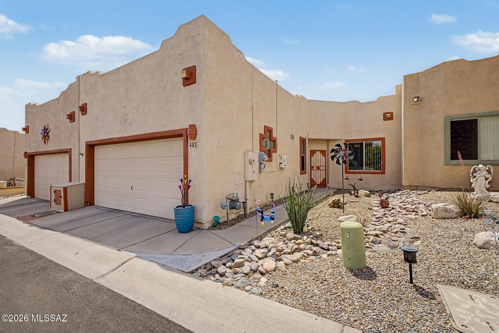 This beautiful 1,168 sq ft townhome offers comfort style and thoughtful updates throughout. Featuring 2 bedrooms, 2 bathrooms, and a double car garage,  this home is move in ready and full of value. Enjoy peace of mind with a roof recoated in 2026 and owned solar installed in 2022. The exterior has been freshly painted, and the transferable home warranty adds even more convenience. Step inside to an inviting interior with a calm open feel. The kitchen features beautiful ceramic flooring, stainless steel appliances, and a spacious pantry closet. Enjoy casual mornings in the cozy breakfast nook or host meals in the dining area just off the living room. Out back, the patio has been beautifully redone with brick pavers, decorative gravel, and mature desert landscaping-perfect for relaxing or entertaining. Residents also enjoy access to the Canyon View clubhouse featuring a library of books and puzzles, a workout area, kitchen space, community events, salt water pool heated year round and much more. This home does not have GVR but it gives you the option to add if desired. 
Come take a look schedule your tour today!