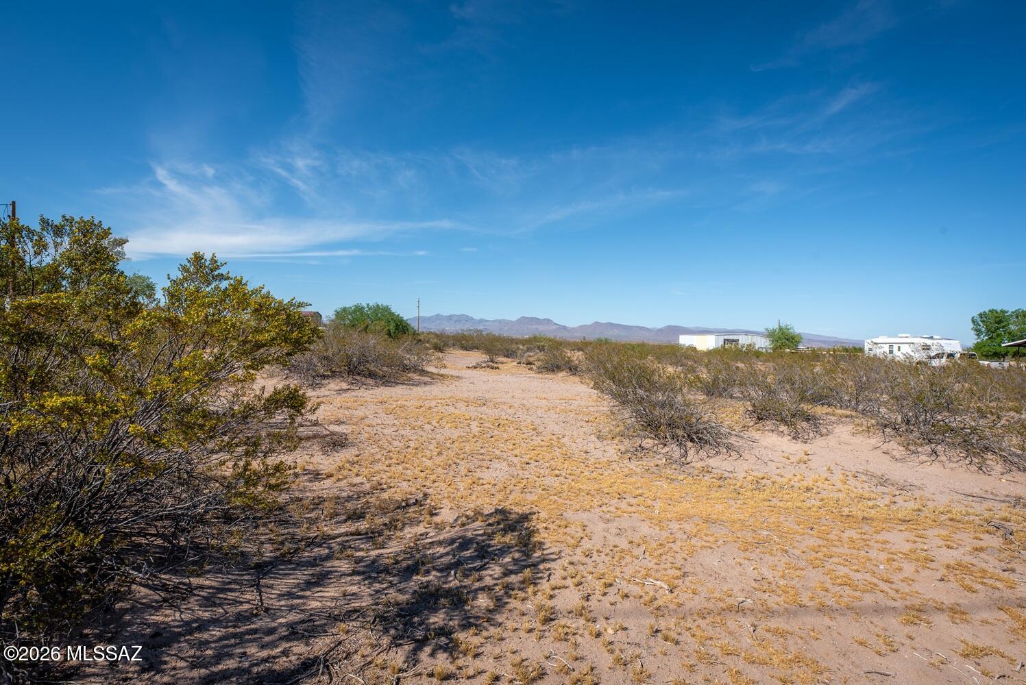 This 2.5-acre lot in Safford, AZ offers wonderful mountain views, making it an ideal location for building your dream home. The property's relatively flat terrain simplifies construction, and electricity is conveniently nearby. While a septic system will need to be installed, the property provides excellent potential for creating a beautiful living space. Whether you're planning to build a custom house or place a large, manufactured home, this lot offers the flexibility to suit your needs. Situated on the outskirts of town, it's perfect for those seeking a tranquil lifestyle away from city noise while still being conveniently close to amenities. Don't miss out on this opportunity!!