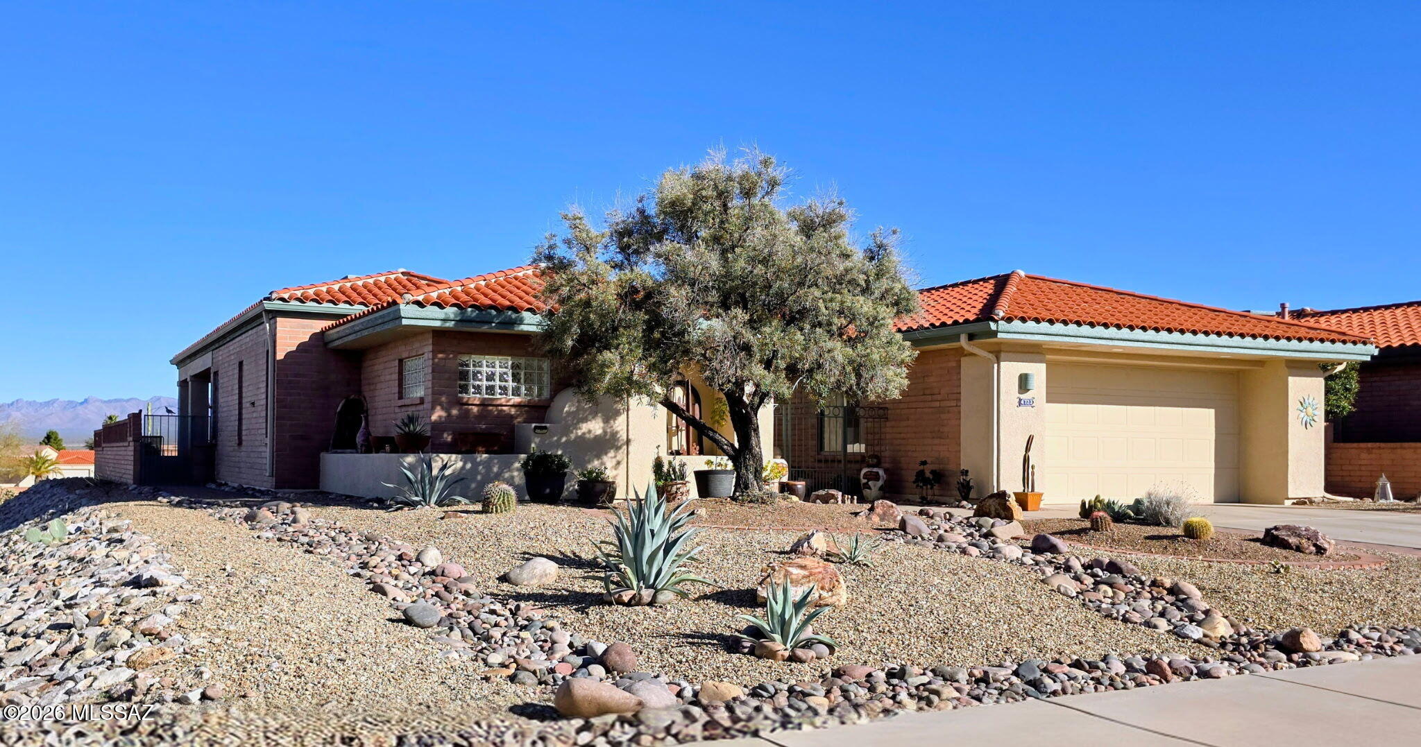 Panoramic mountain views from inside and outside. 2 covered back patios for entertaining or just relaxing and a large front courtyard for morning coffee. The M/suit is spacious with an attached sitting area or den plus a private covered patio. This home is very open, light and spacious. Large laundry/hobby room and oversized garage.