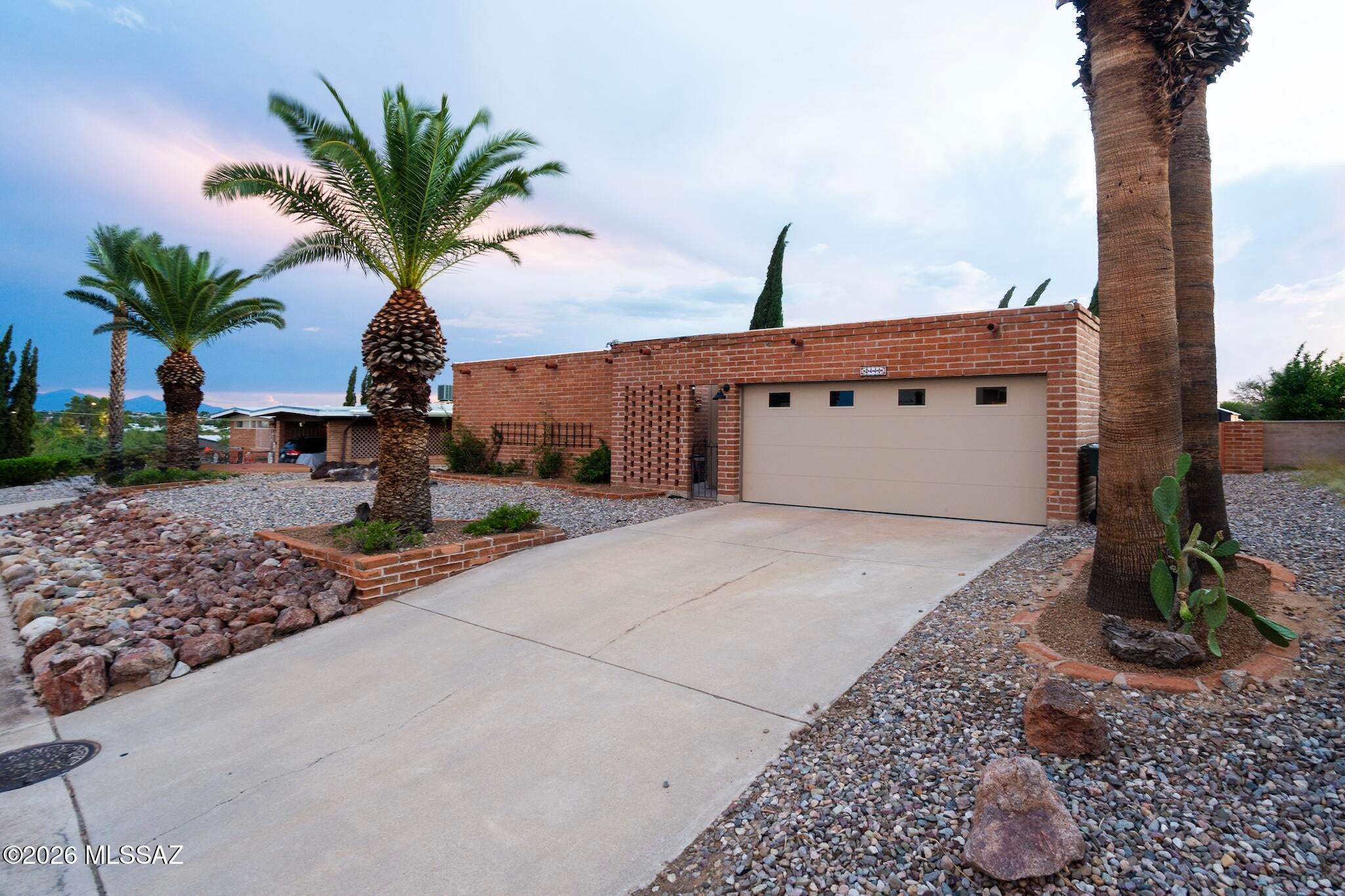 Set on an elevated lot with mountain views, this classic Tucson home stands apart from the typical subdivision setting. 

The backyard is the star, with a crystal-clear pool deep enough for that perfect cannonball, a covered patio and plenty of space to enjoy Tucson's outdoor lifestyle. 

Inside, brand-new LVP flooring throughout creates a fresh, updated, and cohesive feel. The fully enclosed 2-car garage offers substantial storage, and there's no HOA. 

Rolling Hills Golf Course is just down the street, adding openness to the surrounding area, while Saguaro National Park East is approximately 10 minutes away. Hiking, cycling, shopping and dining are all within easy reach.