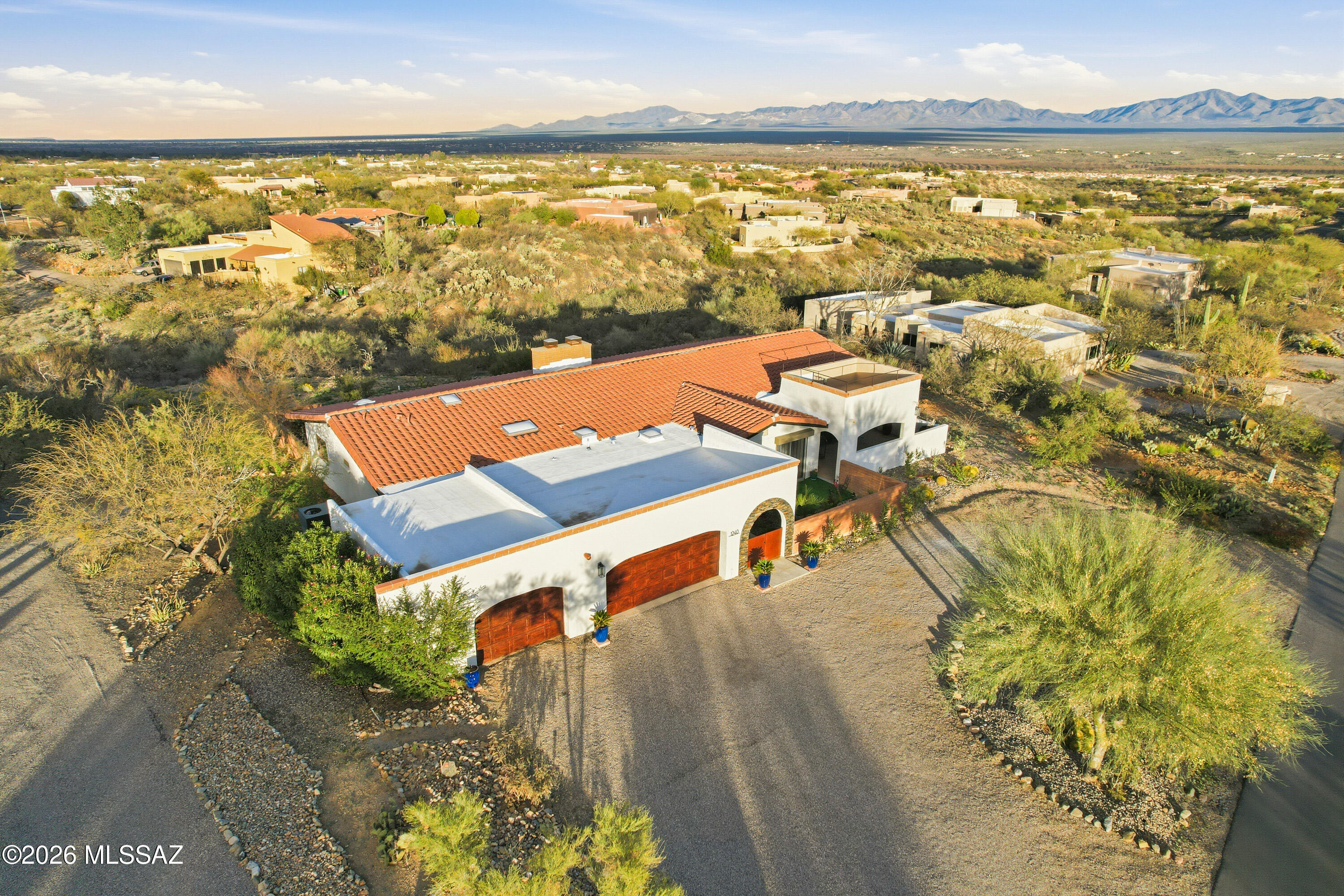 Spectacular views!! Beautiful and fully remodeled in 2025 2 bedroom 2 bath main home with attached 1 bedroom/1 bath fully self contained mother in-law apartment. Roomy master bath and walk-in closet. New Kitchen and appliances with large breakfast bar into the great room, ledger stone fireplace, dining room/area and vaulted solarium with among the finest mountain-range views in Green Valley. Wrap around covered porch with open brick patio and views, views, views! 3 garage with a storage room. Located on just over 1 acre. No age restriction, has GVR. in addition, mature landscape with several orange, tangerine and cocktail grapefruit. Away from freeway and traffic noise or overhead power.