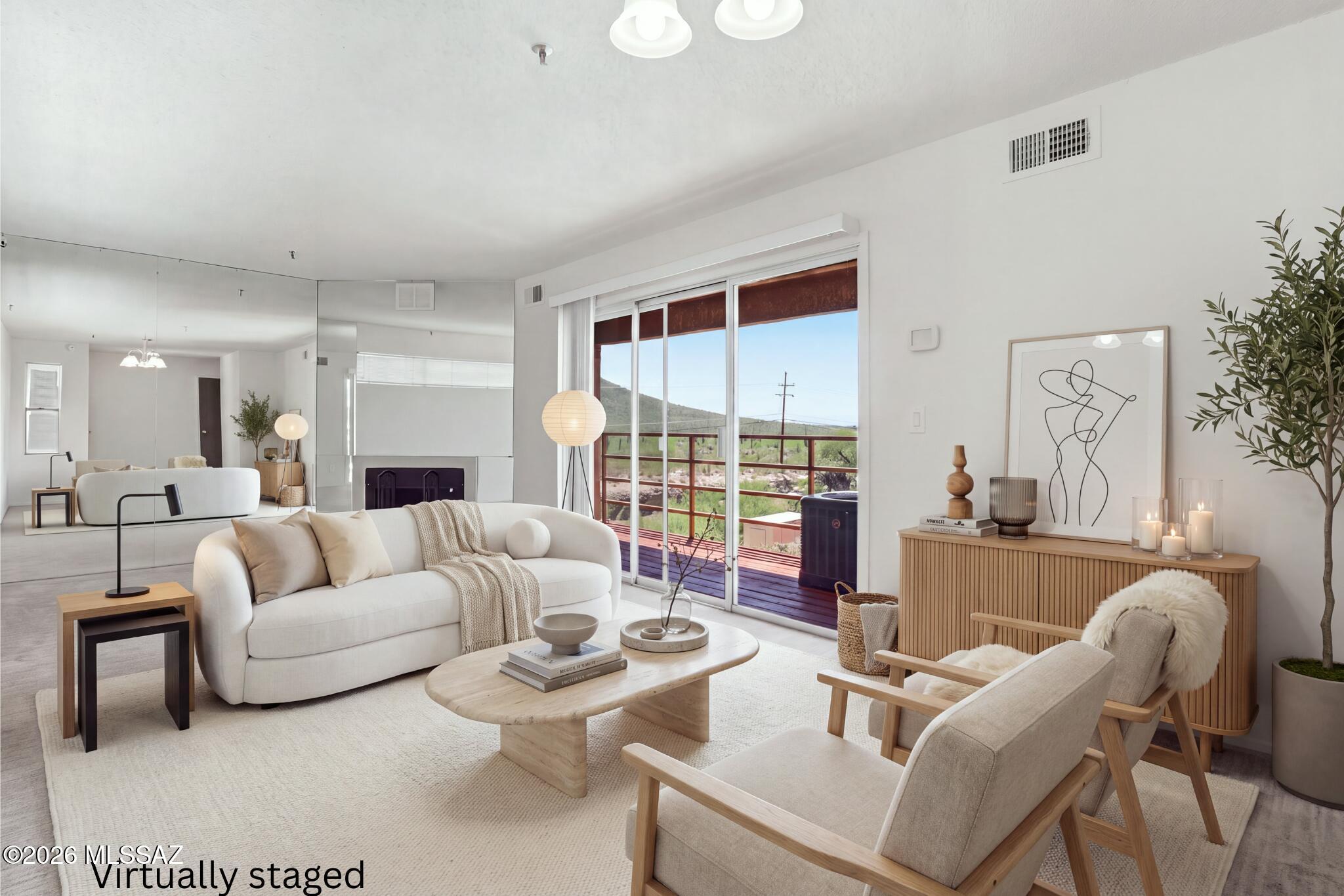 Welcome to La Vida Condominiums, a community in the heart of Tucson with beautiful views. This second-floor unit (just one flight up) has been recently refreshed with cosmetic updates, and new carpet. HVAC and water heater are both newer.
Inside, the open floor plan connects a large living area, dining space, and kitchen with a wood fireplace. The kitchen offers wood-look countertops with plenty of workspace, an electric range with microwave, refrigerator, dishwasher, and ample cabinetry.
The generously sized primary bedroom features mountain views, a large walk-in closet, a private patio, and an en-suite bath with a separate shower and vanity. A second guest bedroom includes a large closet and a guest bath with shower, tub, and vanity. Step outside to your private balcony and enjoy the mountain views and panoramic sunrises and sunsets. Your own covered parking space is included.
About La Vida: a highly desirable location close to shopping, restaurants, Pima Community College, 4th Avenue, and the university. HOA dues cover water, garbage, recycling, sewer, building maintenance, landscaping, and covered parking.
Relaxed indoor/outdoor living. This one won't last long!