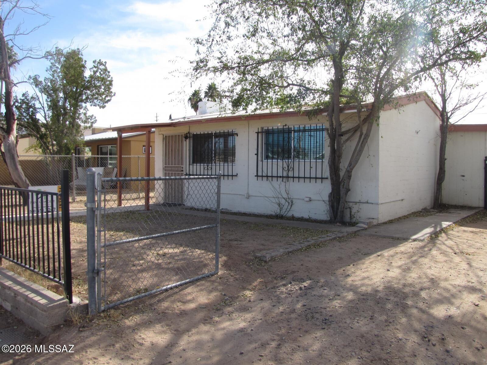 Welcome to this charming central Tucson home, located on a quiet street in an established neighborhood. The home features updated kitchen cabinets and dual-pane windows, blending classic Tucson character with thoughtful updates. The functional layout offers comfortable living space, while the private yard provides room to relax or personalize.

Conveniently situated near shopping, dining, schools, and major roadways, this home offers both accessibility and neighborhood charm. A great opportunity for an owner-occupant or investor looking for a well-located property with recent improvements and future potential.

Buyer to verify all facts, including square footage, schools, and zoning.