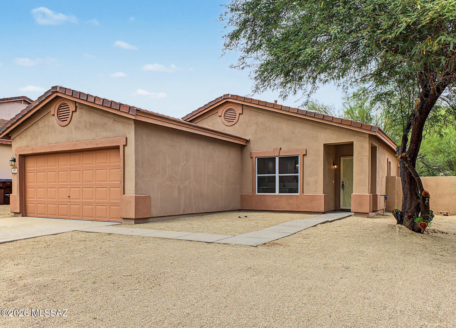 Move-in ready single-story home in desirable Rancho Sahuarita! This 3-bedroom, 2-bath residence offers a functional layout with a 2-car garage and inviting covered patio. The updated kitchen features Quartz countertops and stainless steel appliances, complemented by modern lighting and plumbing fixtures throughout. Fresh interior and exterior paint creates a clean, contemporary feel, while low-maintenance decorative rock adds to the curb appeal. Enjoy all that Rancho Sahuarita has to offer with an abundance of community amenities, including parks, pools, walking paths, recreation areas and more. A must see!