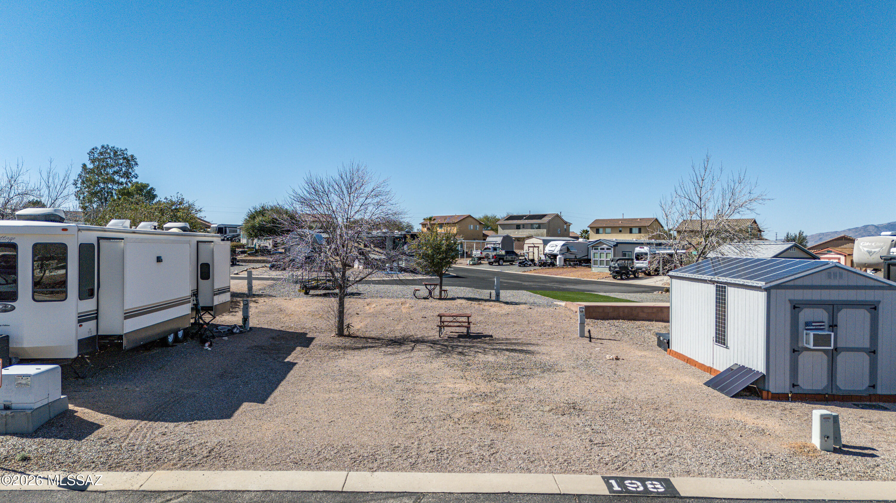 Discover the perfect RV lot packed with amenities galore! Enjoy sunny afternoons by the sparkling pool or unwind in the relaxing sauna. Gather with friends and neighbors at the spacious picnic area, challenge someone to a friendly game of corn hole, or stay fit in the outdoor covered exercise area.Convenience is key with an on-site laundry facility and a well-appointed shower room to keep you feeling refreshed. The welcoming community building featurees a comfortable TV lounge area, a cozy library, and a fun-filled game room for socializing and entertainment.Whether you're seeking relaxation, recreation, or a vibrant community atmosphere, this RV lot has it all. Community Events are offered and much more!