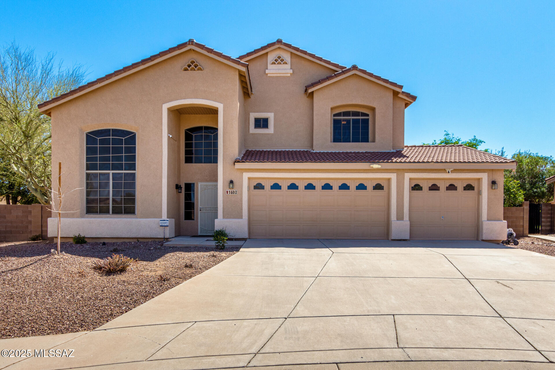 Stunning 2-story gem with mountain views! This gorgeous home boasts a 3-car garage w/attached cabinets for extra storage. Discover wood-look and tile flooring in all the right places, clerestory windows, & soaring vaulted ceilings. The inviting living/dining area flows seamlessly into the great room, where a cozy gas fireplace sets the perfect ambiance for gatherings. Well-appointed kitchen features SS appliances, ample counter space, wood cabinetry, built-in desk, & center island w/breakfast bar. Spacious main bedroom offers a versatile sitting area, a private balcony access, & an ensuite w/two vanities & walk-in closet. Enjoy breathtaking mountain views from the balcony or relax in the backyard oasis, complete with covered patio, sparkling pool, & soothing spa. Don't miss this home!!