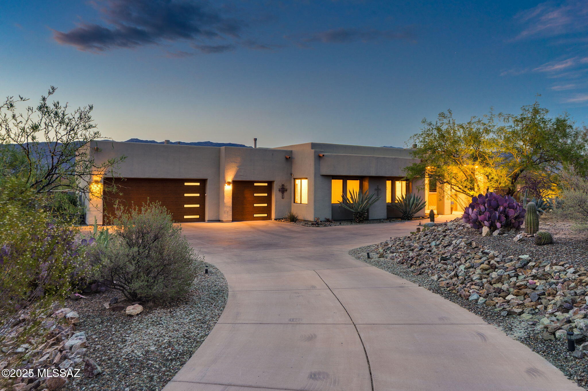 Indulge in true luxury and resort-style living in this beautifully upgraded home featuring over 1,500 square feet of covered patio space—perfect for year-round entertaining. Step into your private retreat with a sparkling pool, relaxing hot tub, outdoor kitchen and breathtaking views that create a tranquil, vacation-like setting. Inside, enjoy a brand new custom kitchen designed for both beauty and function, along with recently replaced HVAC systems, RO system, water softener, water heater and new garage doors for peace of mind. This is the ultimate blend of comfort, elegance, and lifestyle—all in one exceptional home.  Located in the gated Coyote Creek neighborhood.