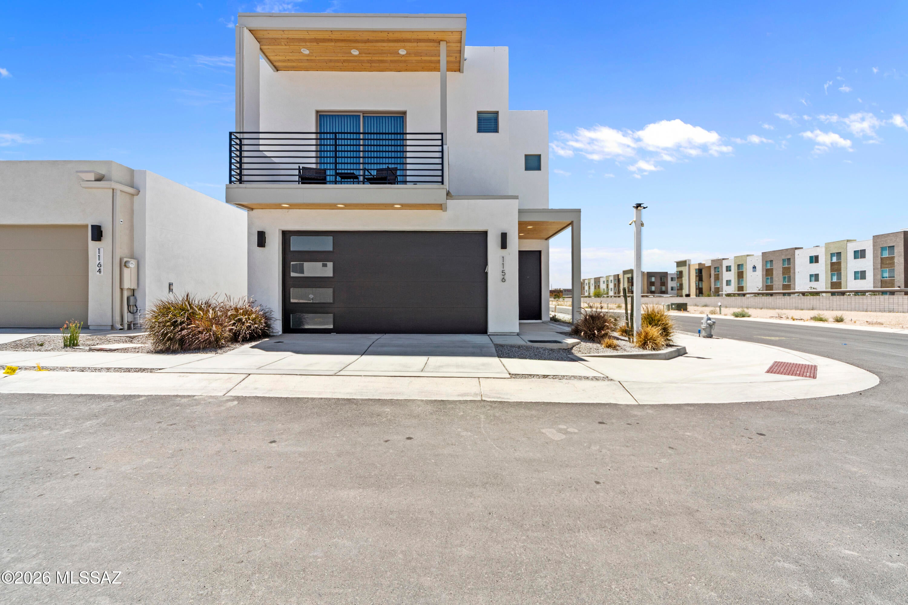 A fresh expression of modern living. The Avant brings a bold, contemporary spirit to The Pearl. Its clean lines, generous windows, and intuitive two story design create a home that feels energized and inspiring from the moment you enter. Inside, the balance between connection and retreat is beautifully executed. The main level invites gathering, creativity, and the natural flow of daily life. The upper level offers peaceful separation and thoughtfully designed bedrooms made for rest and restoration. Located within The Pearl's gated community and steps from The Bridges Marketplace, The Avant connects you to the best of Tucson including dining, entertainment, the University of Arizona, and the vibrant experiences of downtown.