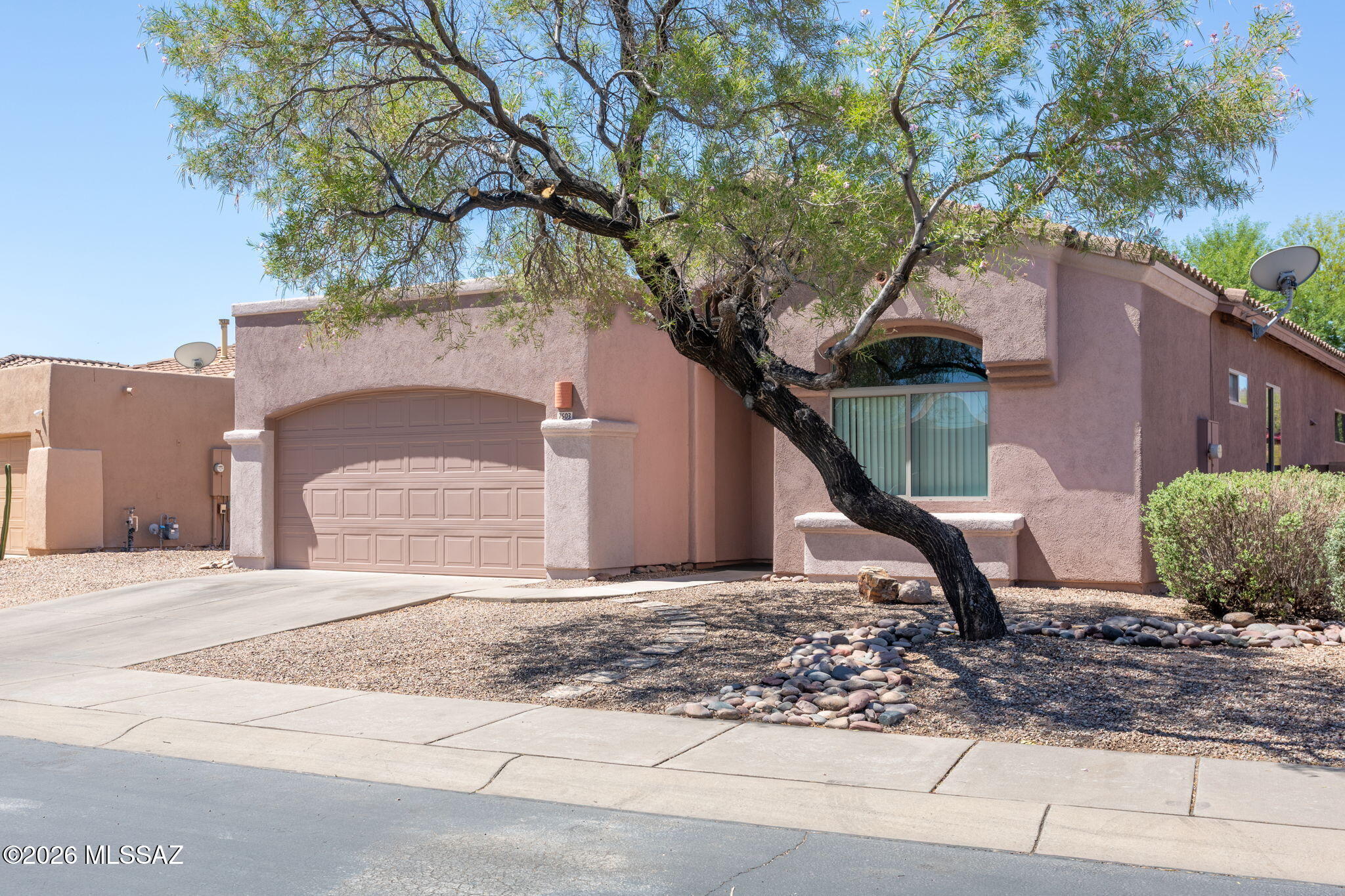 3% SELLER CONCESSIONS. Perfect Starter Home, Located in Desirable Sierra Crest Gated Community. This Sought After AF Sterling Home offers 4BD/2BA, Freshly Painted Inside and Out, New Carpeting! This Bright  Open Kitchen has all (Like New) Stainless Steel Appliances, with Beautiful Travertine Countertops, looking into the Great Room, with 10 Ft Ceilings. Spacious Split Bedroom Floorplan offers privacy from the Master Suite. Finished Garage with Shelving for all your Storage Needs, New Garage Door Opener, and New Hot Water Heater Installed. Update Roof! Enjoy access to the Community Pool, and BBQ Grills for your Enjoyment. Walk to Rattlesnake Ridge Elementary, Conveniently Located near Shopping, and Dining. New A/C in August 2022. Seller is a Licensed Realtor in Arizona.