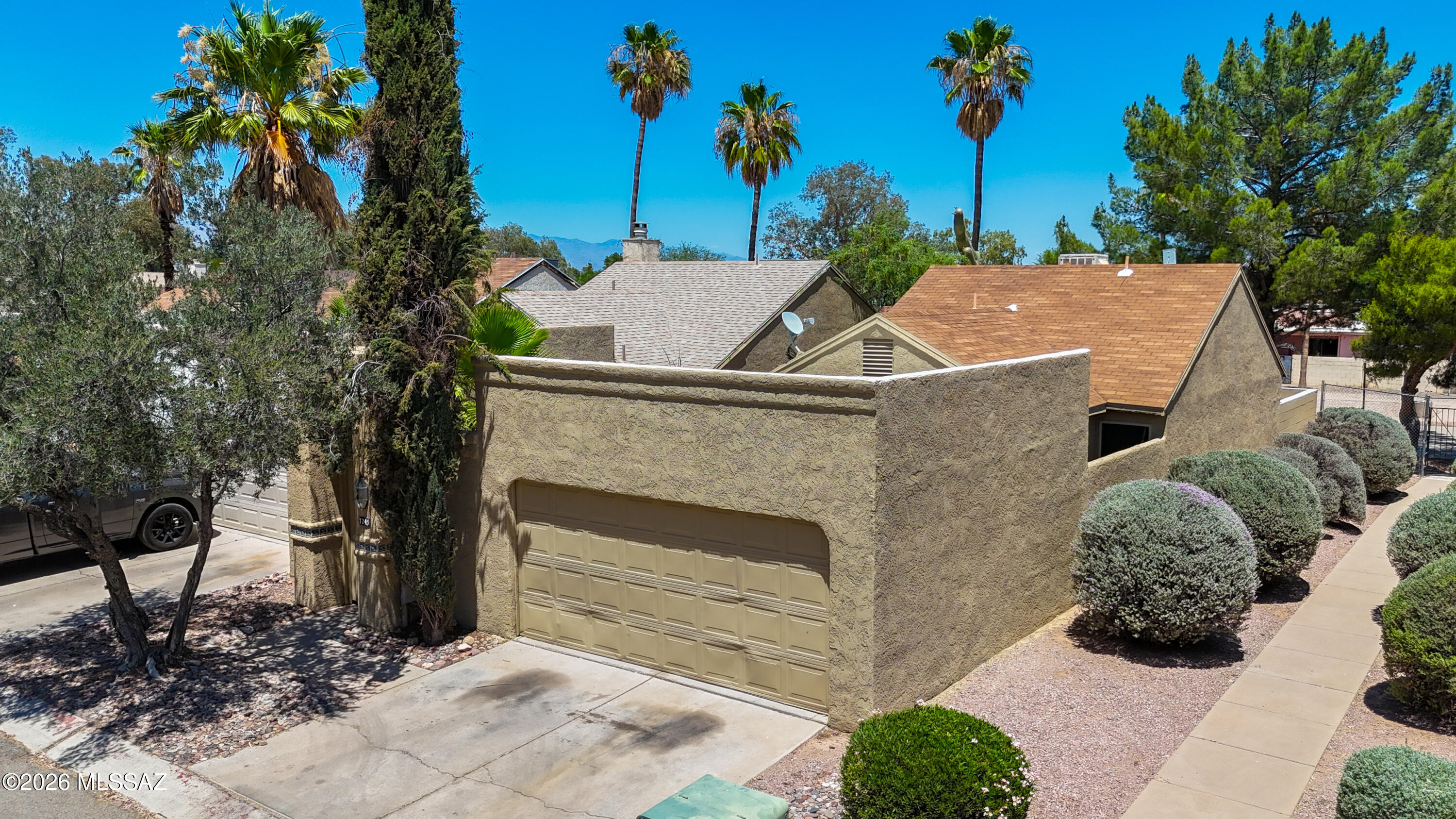 Beautifully remodeled 2-bedroom, 1-bathroom townhouse on Tucson's south side, conveniently located near shopping centers, restaurants, and everyday amenities. This charming home features high ceilings that create a bright, open feel, a spacious living area, and a stunning wood countertop island perfect for entertaining guests. The Jack-and-Jill bathroom offers convenient access from both bedrooms, while the Arizona room provides extra space for a home office, hobby room, or relaxing retreat. Step outside to a private enclosed backyard with direct gate access to the community pool and park, making it easy to enjoy outdoor recreation. A great combination of comfort, convenience, and modern updates.