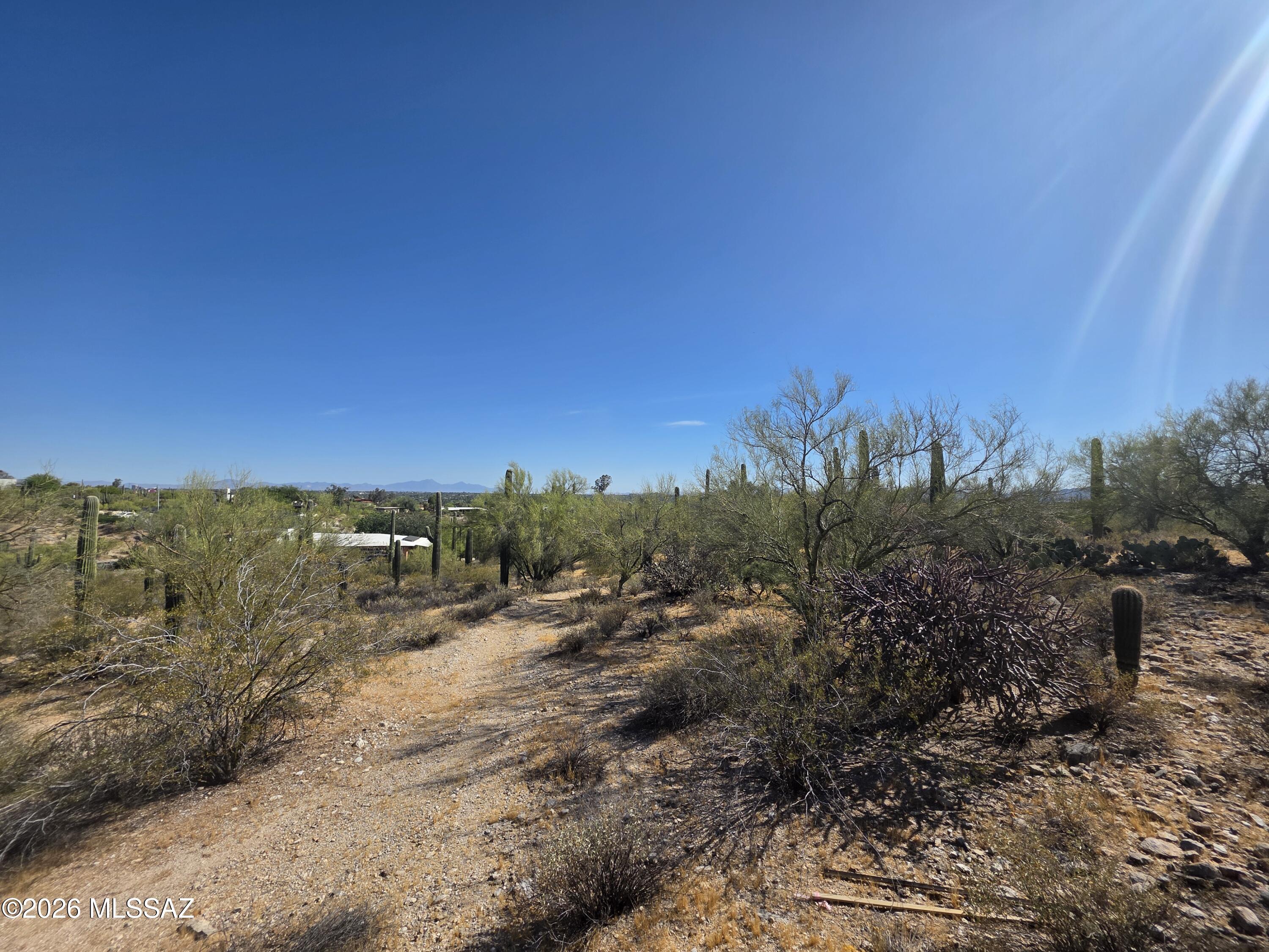 Beautiful views along this quiet Hacienda del Sol corridor. Great north central location with easy access to most that Tucson has to offer. This listing is for Lot B - the southerly portion of 4675 N Camino Ocotillo.